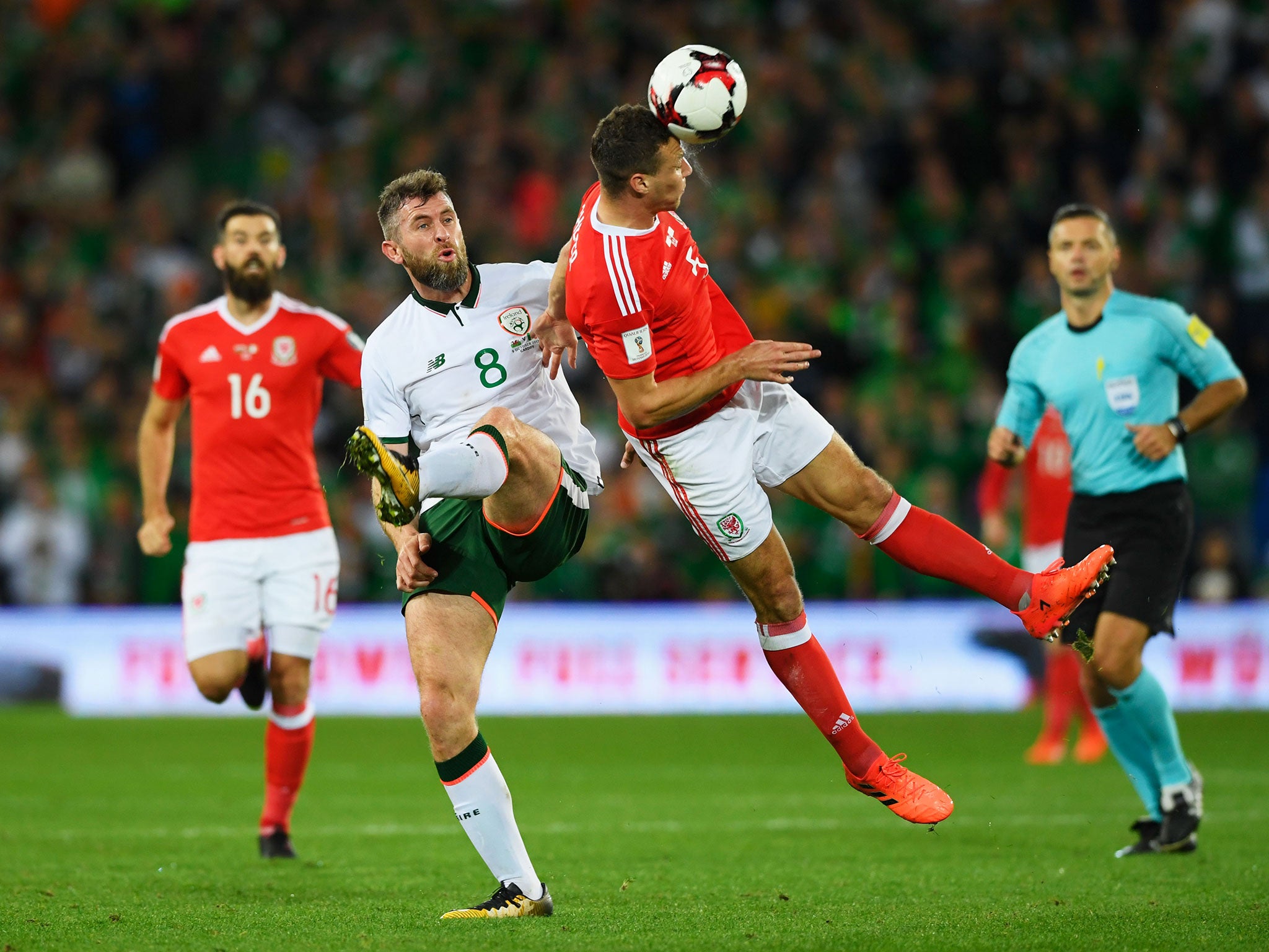 James Chester beats Daryl Murphy to the ball