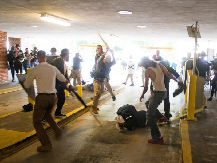 DeAndre Harris was assaulted in a parking garage beside the Charlottesville police station.