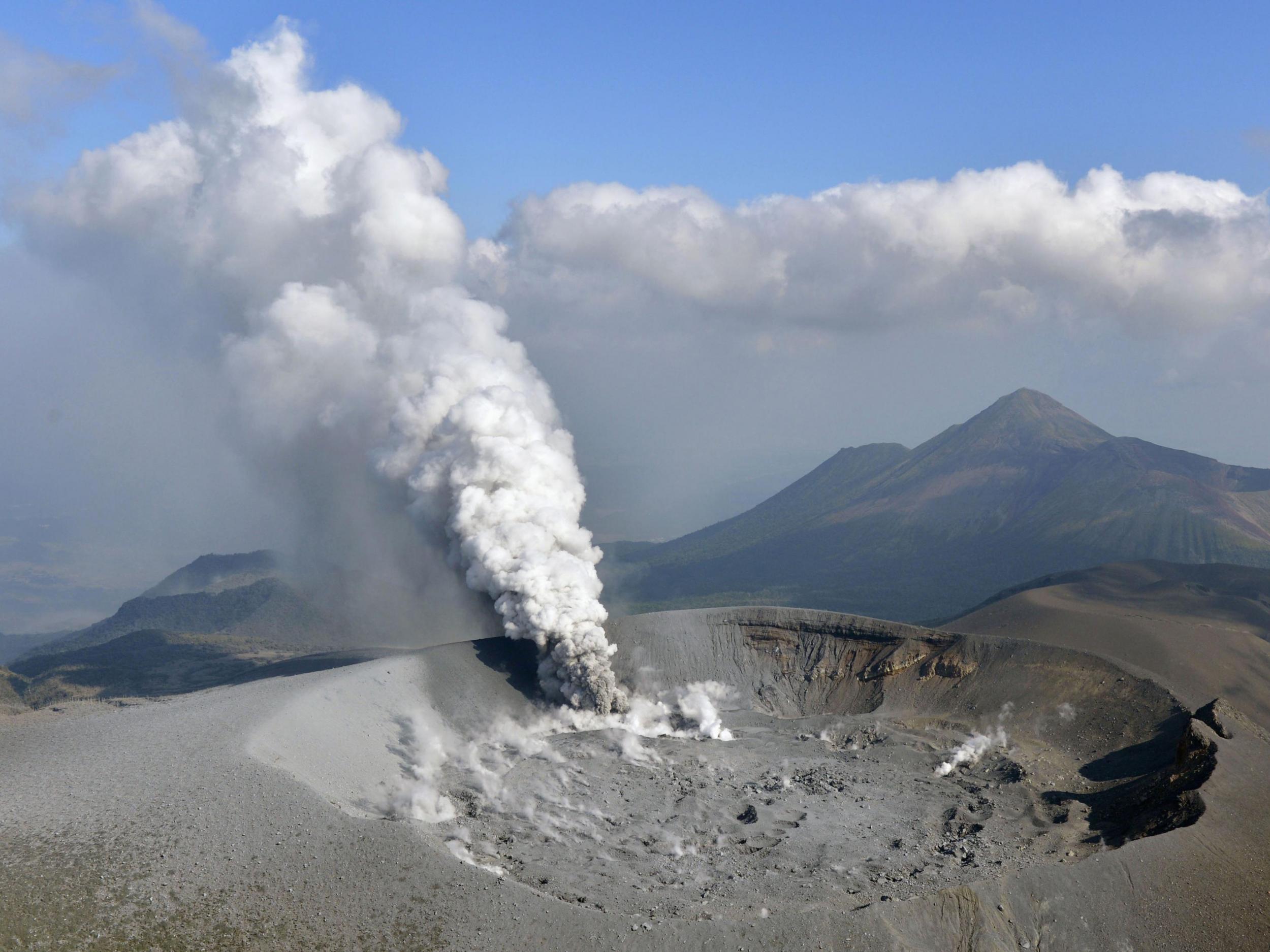 Volcanic smoke rises from the Shinmoedake volcano after its eruption in the border of Kagoshima and Miyazaki prefectures, southwestern Japan