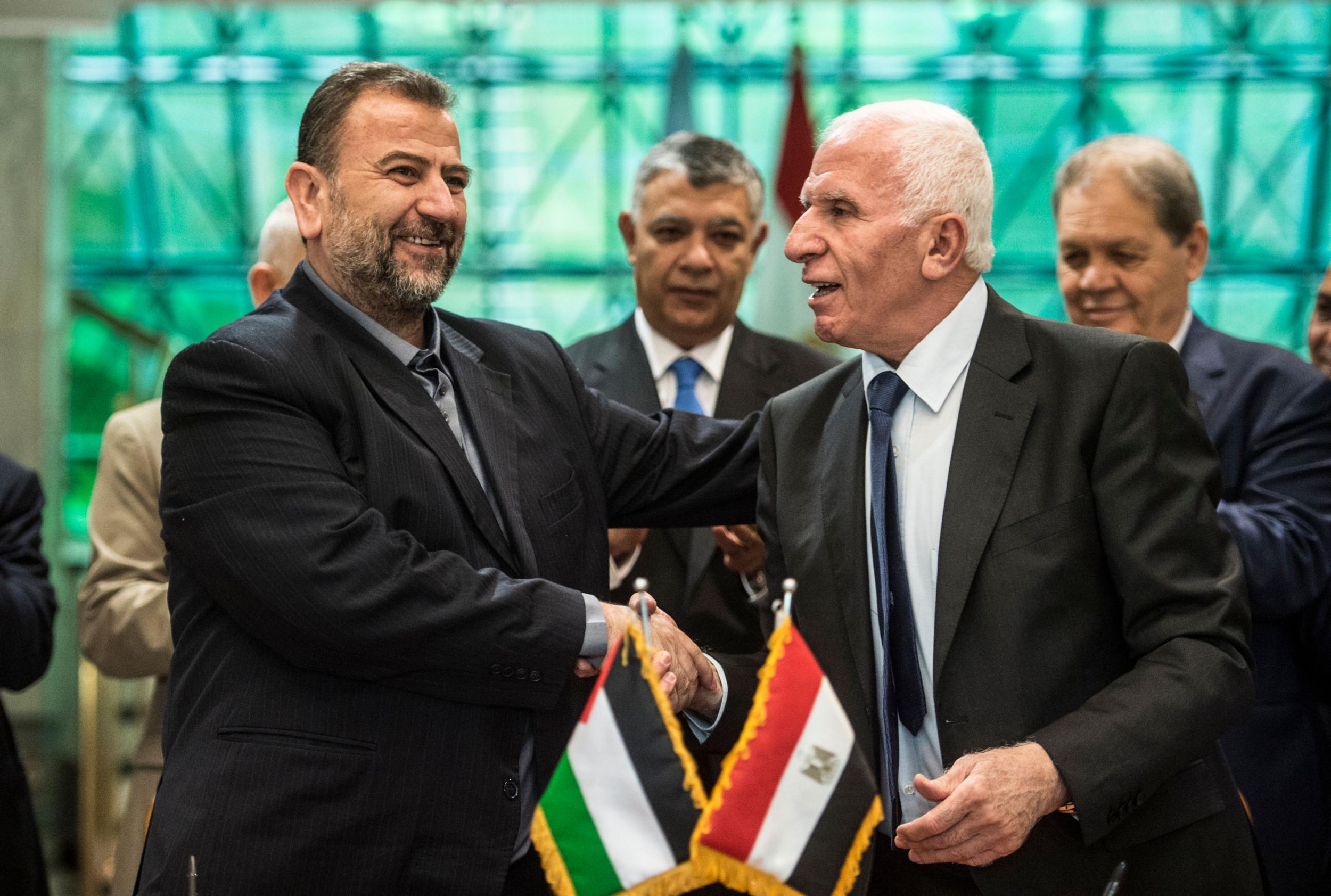 Hamas’s Saleh al-Aruri and Azam al-Ahmad of Fatah end a decade-long division