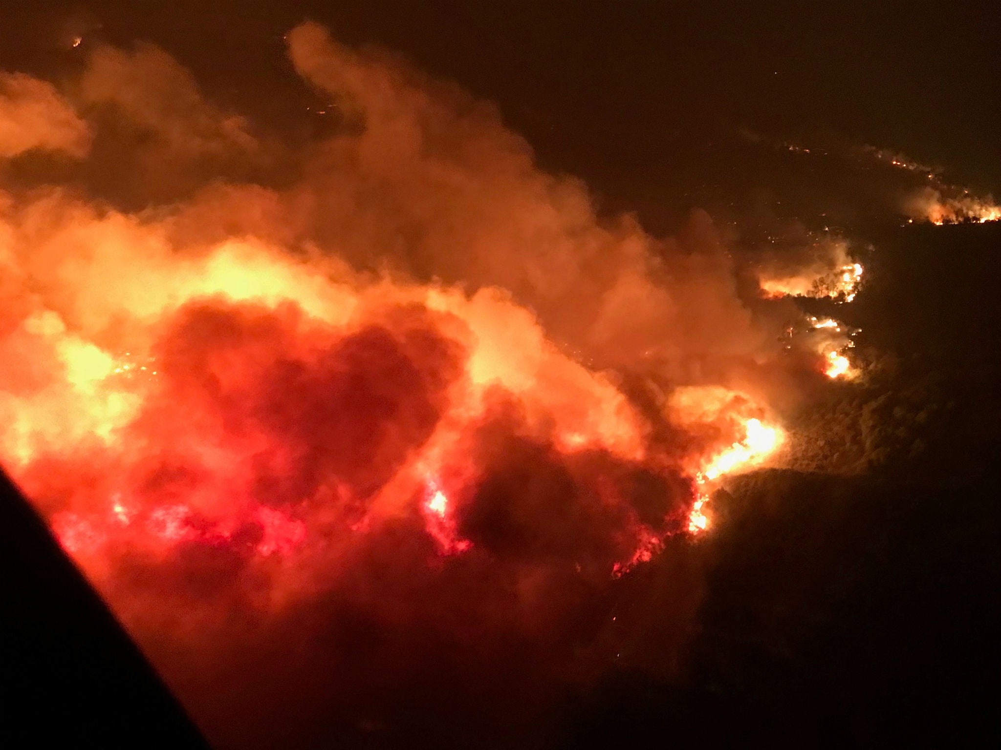 A wildfire is shown from the air near Atlas Road during an operation to rescue people trapped by wildfire in Napa, California, U.S., October 9, 2017