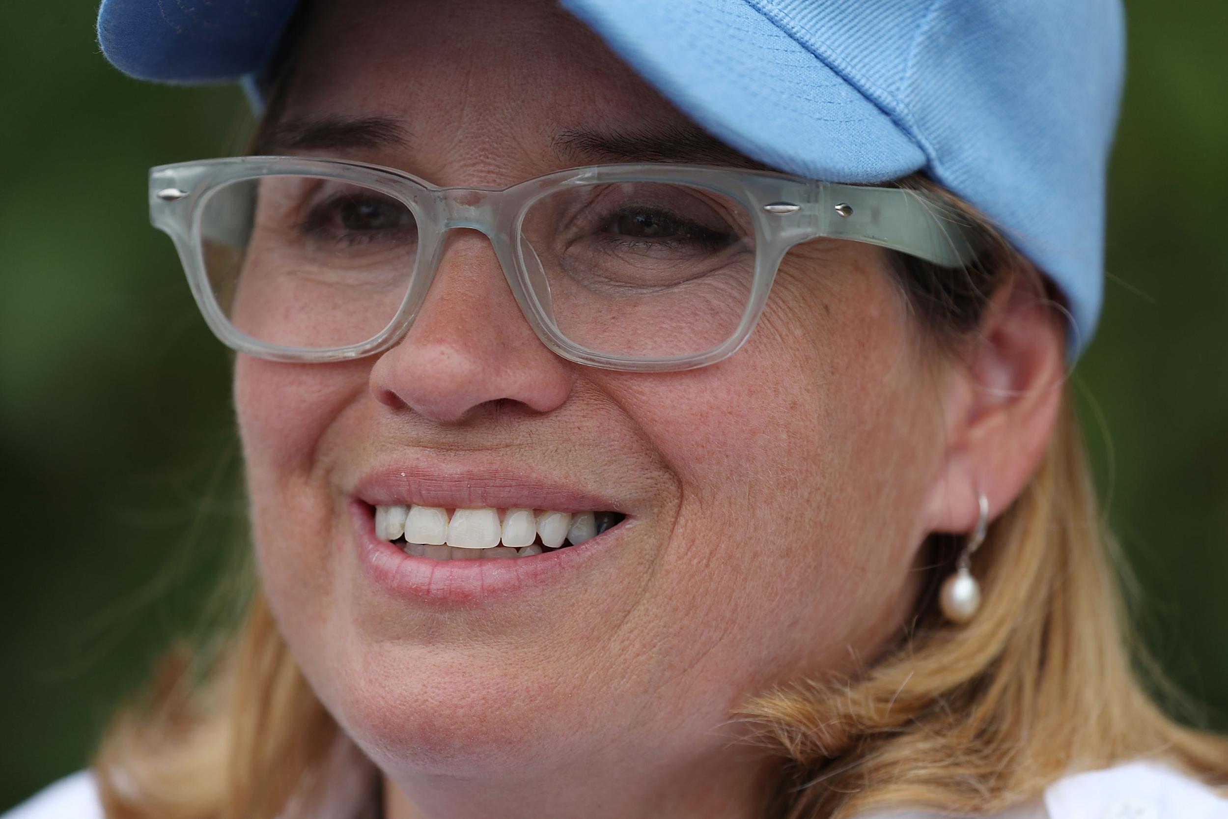 San Juan Mayor Carmen Yulin Cruz speaks to the media as she arrives at the temporary government center setup