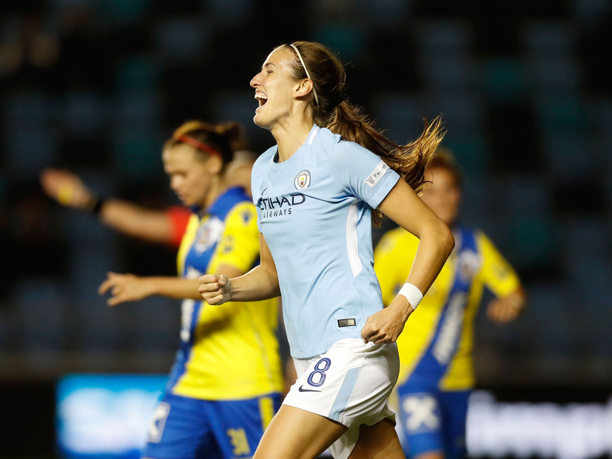 Jill Scott celebrates scoring her side's second goal of the game