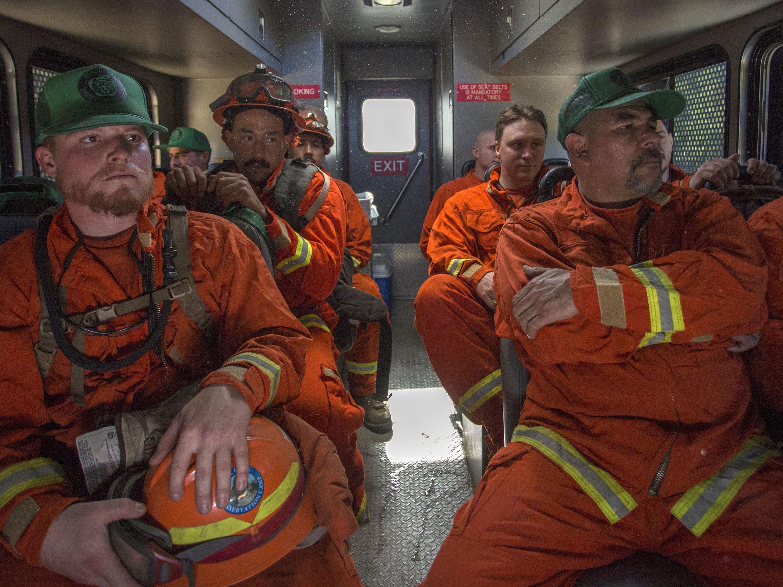 Prisoners have been brought in to help firefighters combat the blazes (DAVID MCNEW/AFP/Getty Images)