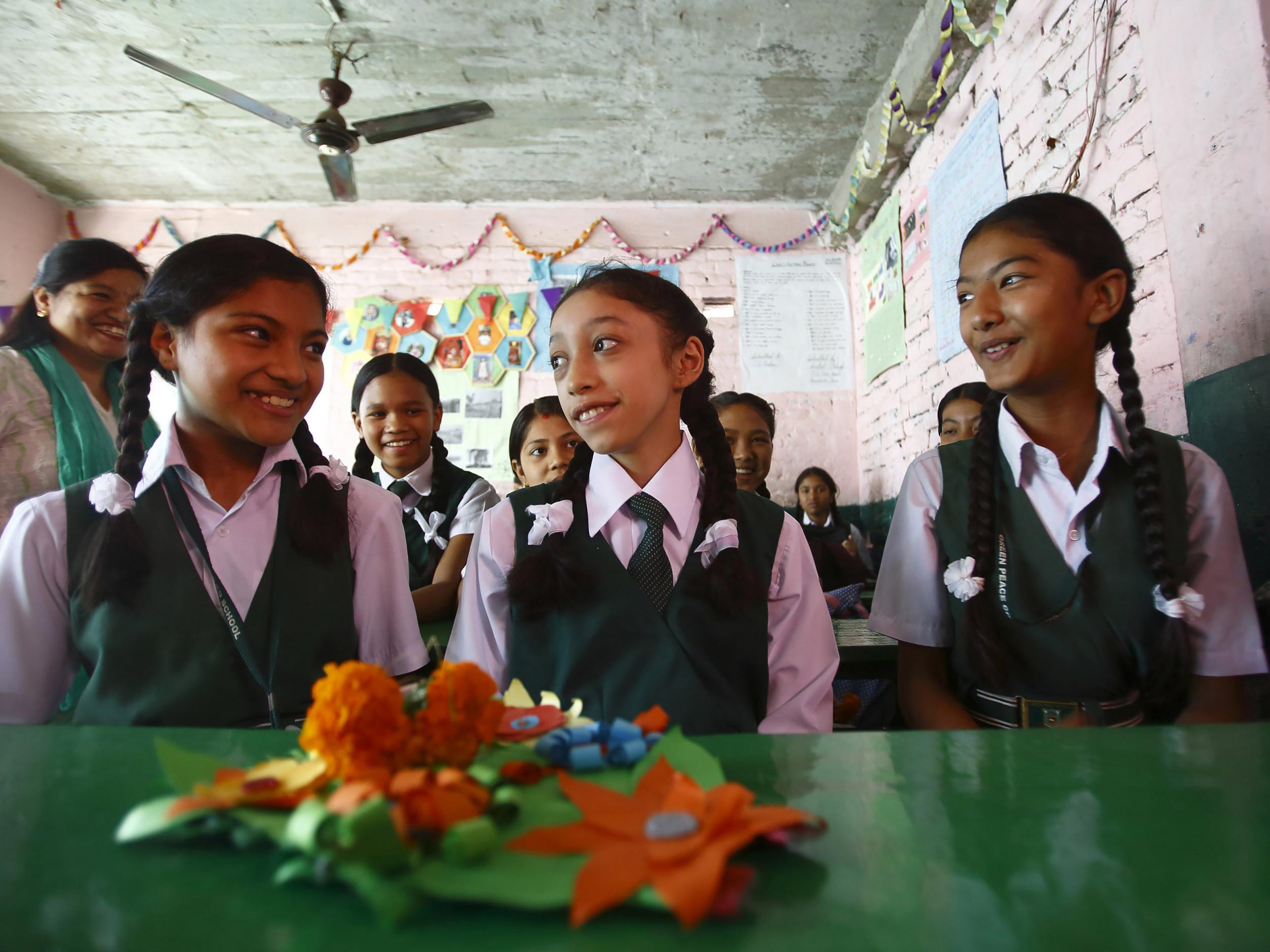 Twelve-year-old former 'living goddess' Matina Shakya in her new school classroom, weeks after leaving her role as Nepal's Royal Kumari