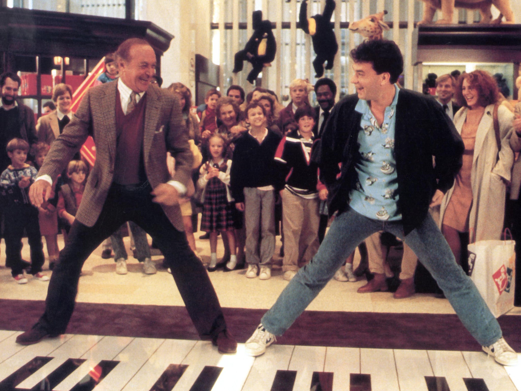 Robert Loggia as Mr MacMillan and Hanks as Josh Baskin in Big (Moviestore/Rex)