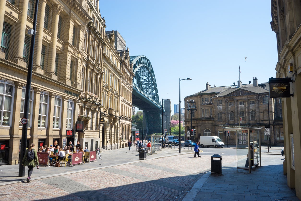 Newcastle’s bustling Quayside district is home to bars, restaurants and music (Getty)