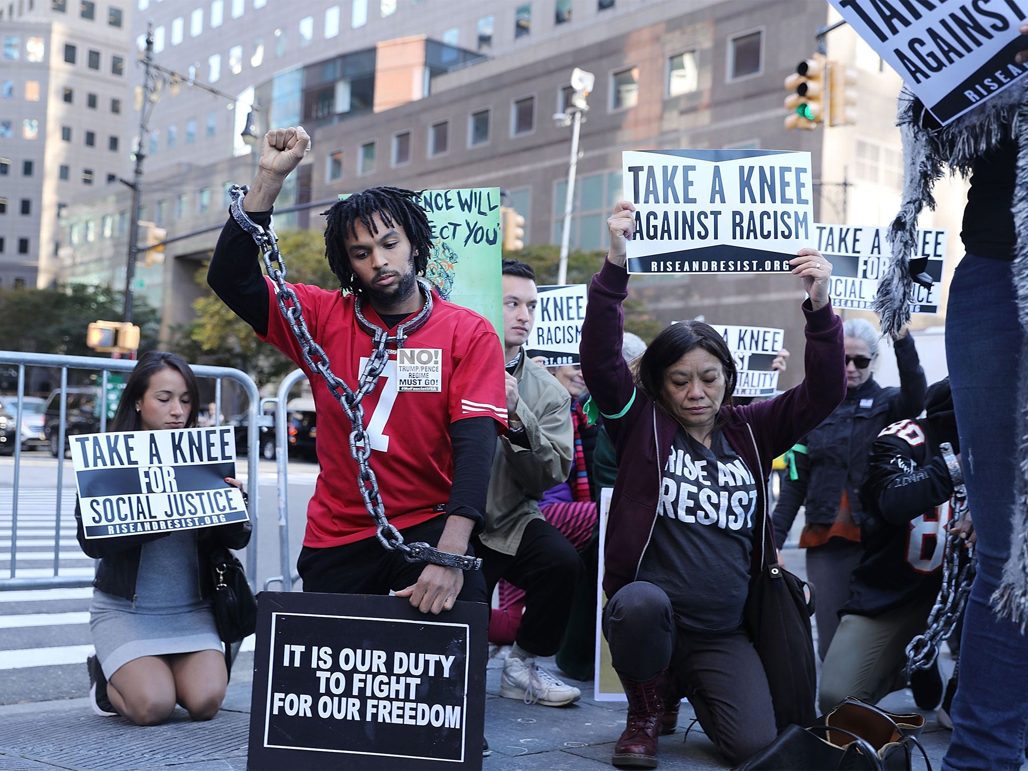 Protestors outside the NFL league meeting on Tuesday in Manhattan