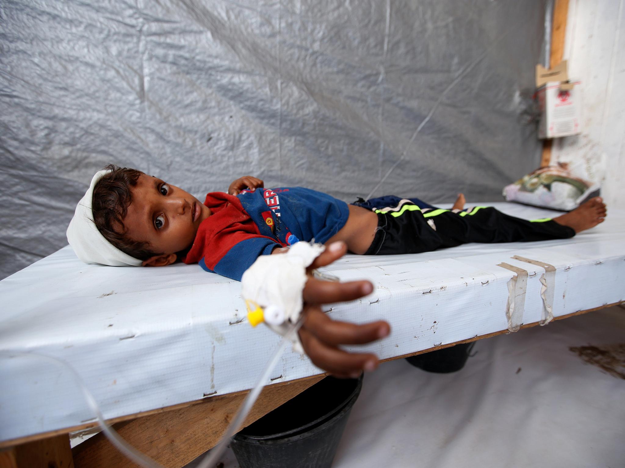 Seven-year-old Siddique Nuruddin Ali is treated for cholera in the Red Sea port city of Al Hudaydah, Yemen, earlier this month