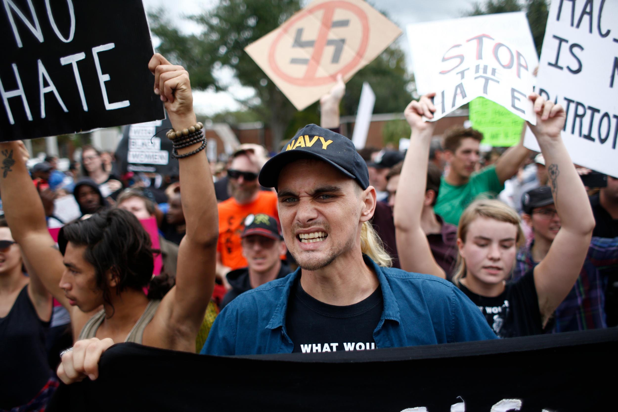 Demonstrators gather at the site of a planned speech by white nationalist Richard Spencer