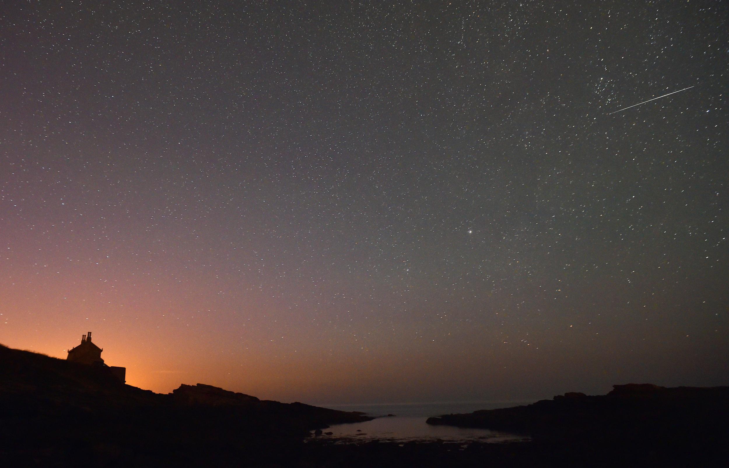 Meteors will be visible in the night sky as the Orionid shower peaks