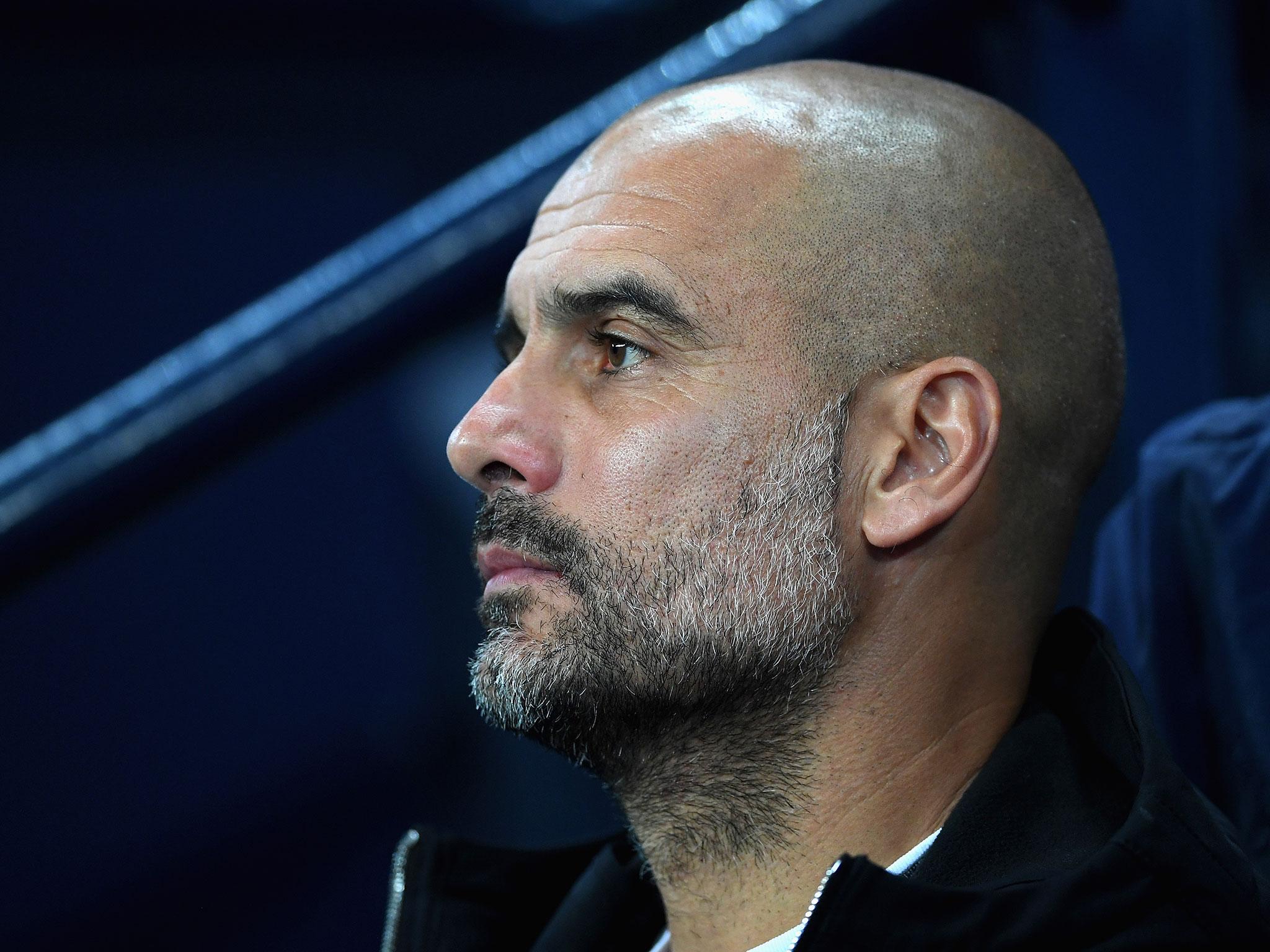 Pep Guardiola has played down early title talk surrounding his side