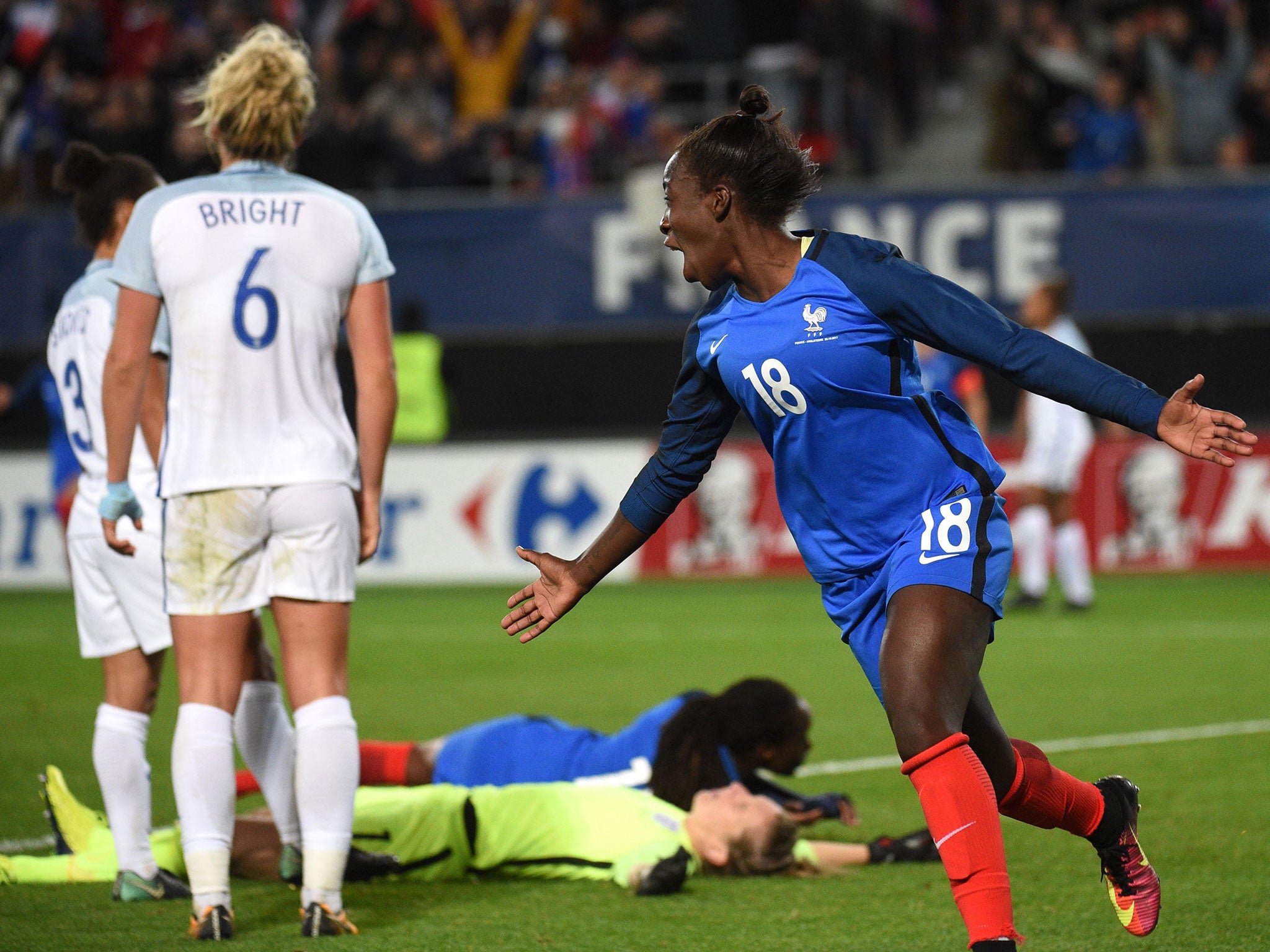 France's Viviane Asseyi celebrates after scoring during the friendly football match between France and England at the Hainaut Stadium in Valenciennes on 20 October