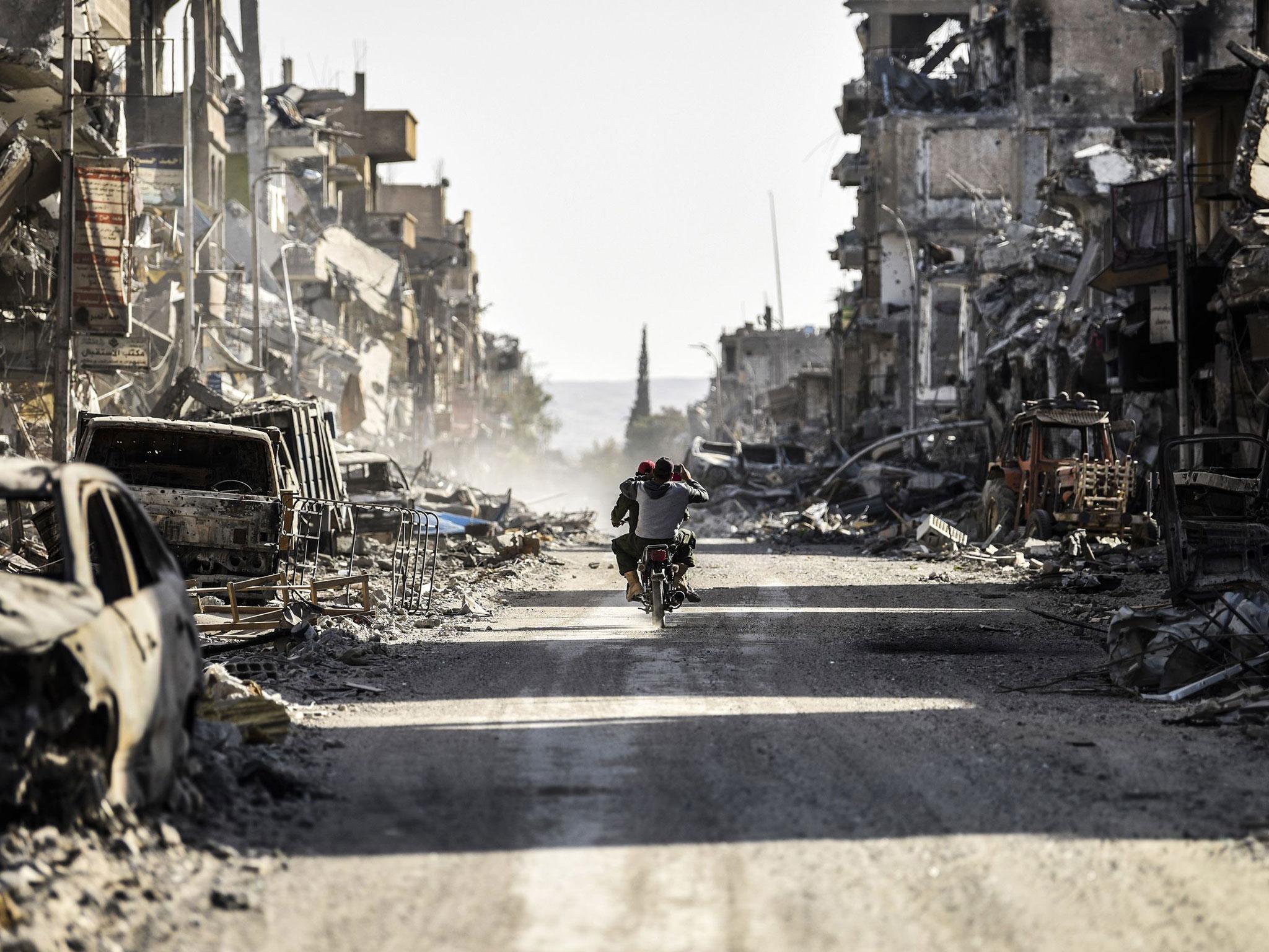 Citizens are slowly returning to the Syrian city. But some militants remain