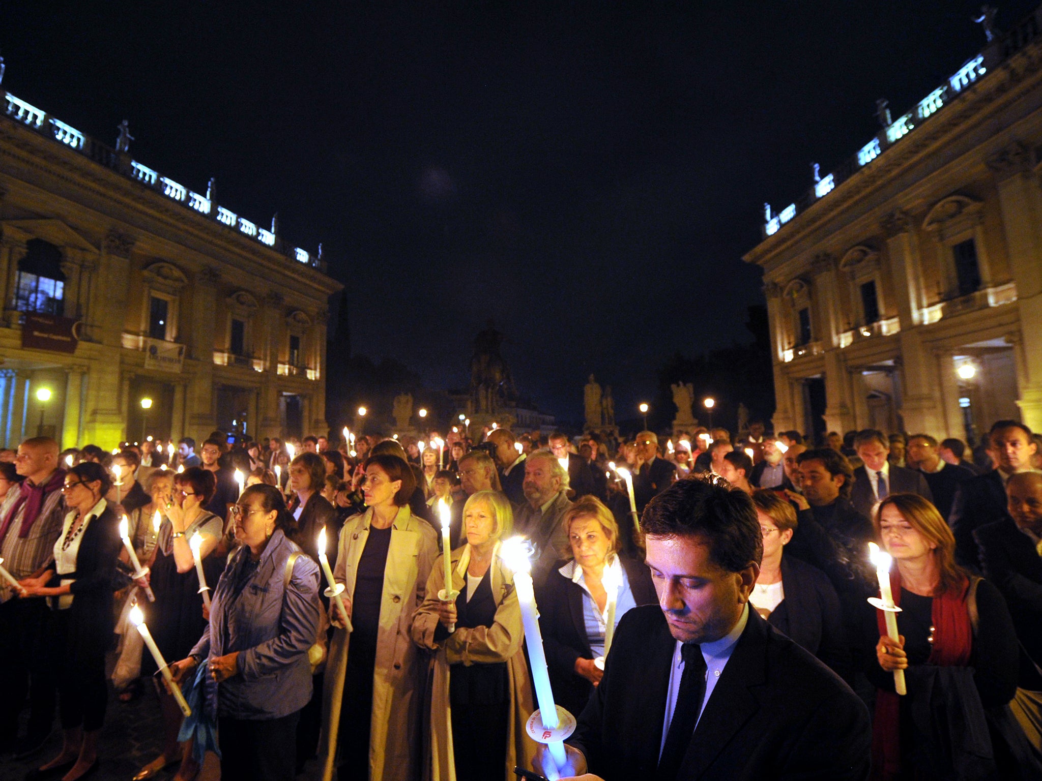 Scores of people in Rome lit candles in memory of the victims of Lampedusa, who had died the previous night