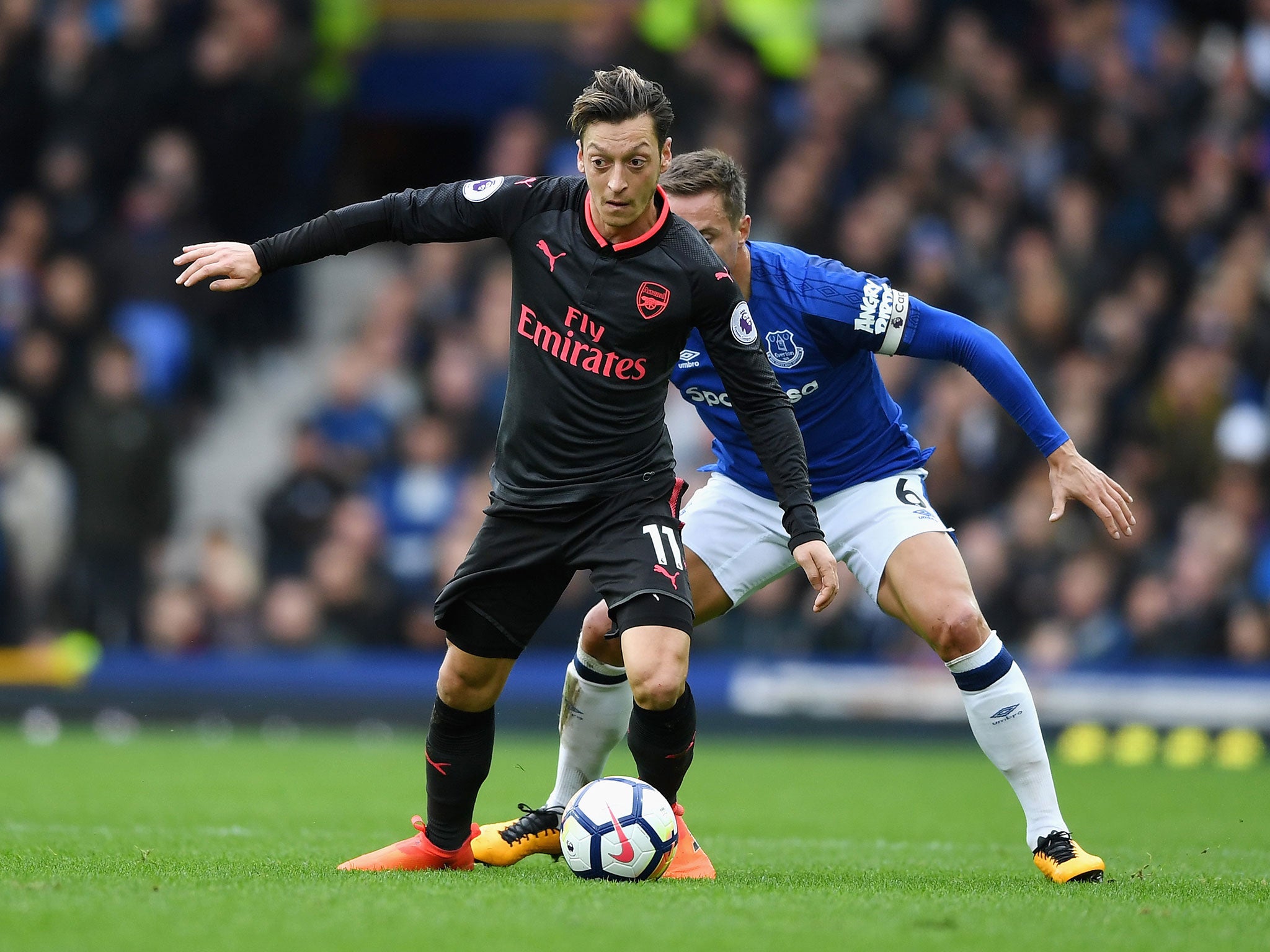 Mesut Ozil in action for Arsenal