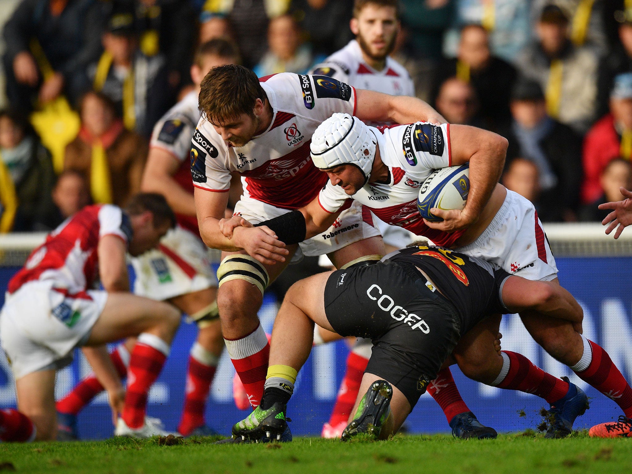 Ulster's Luke Marshall takes the ball into contact