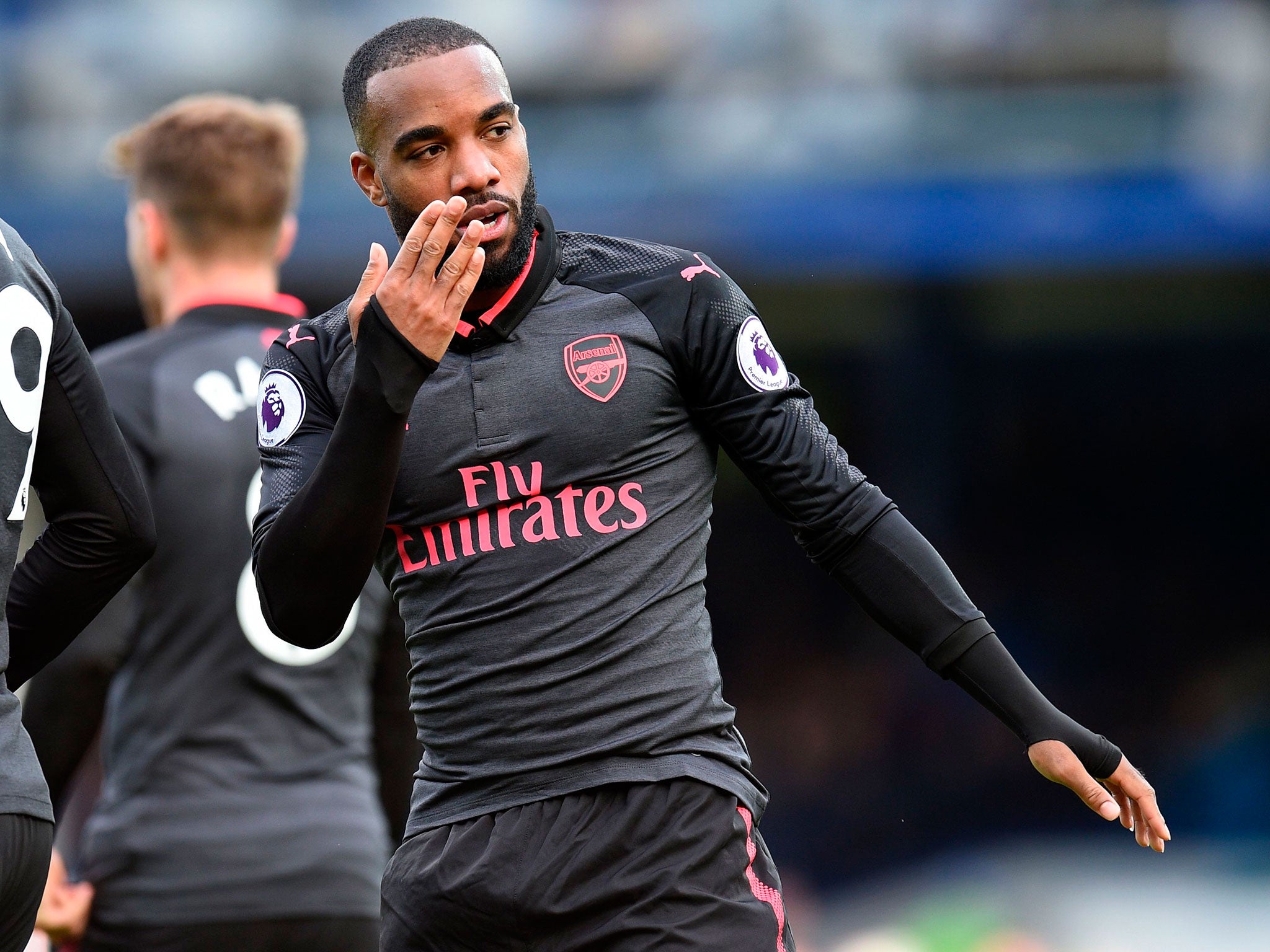 Alexandre Lacazette celebrates his goal against Everton on Sunday