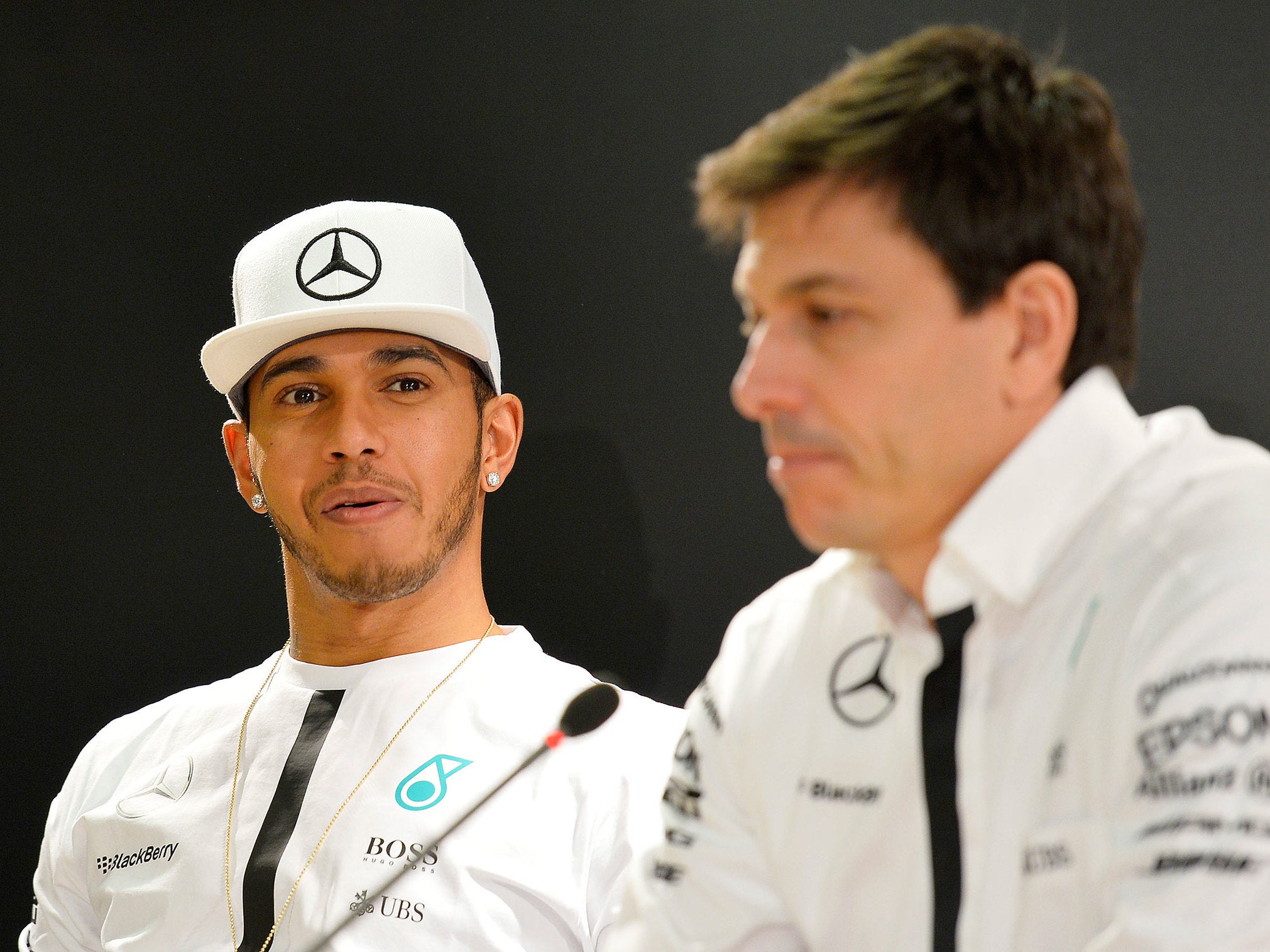 Lewis Hamilton (left) with Toto Wolff, Mercedes' team principal