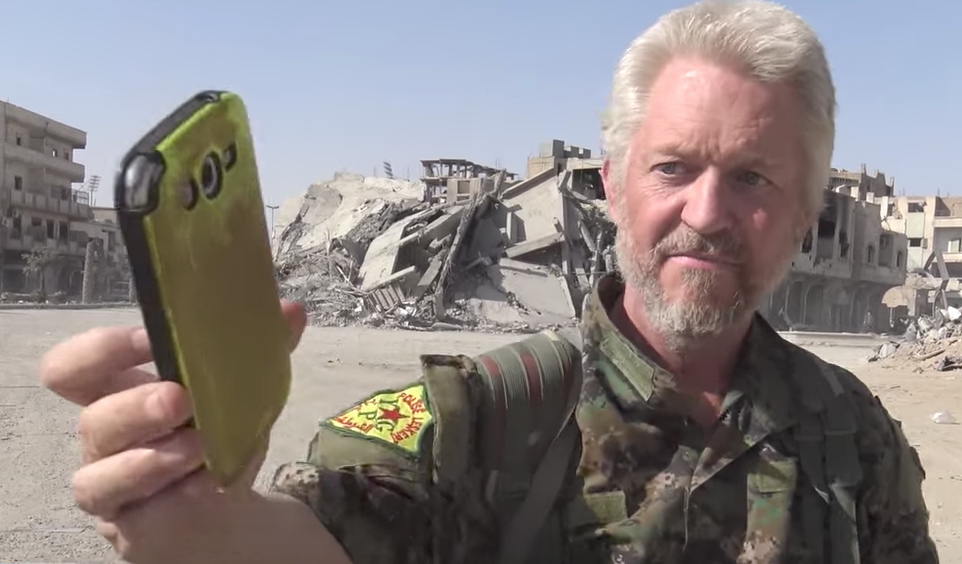 Michael Enright, who had a role in Pirates of the Caribbean: Dead Man's Chest and episodes of CGI, was inspired to join the YPG after Isis burned Jordanian pilot Muath al-Kasasbeh alive in January 2015