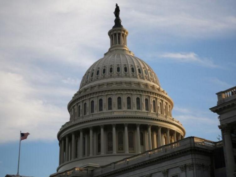 The US Capitol building in Washington seen at sunset