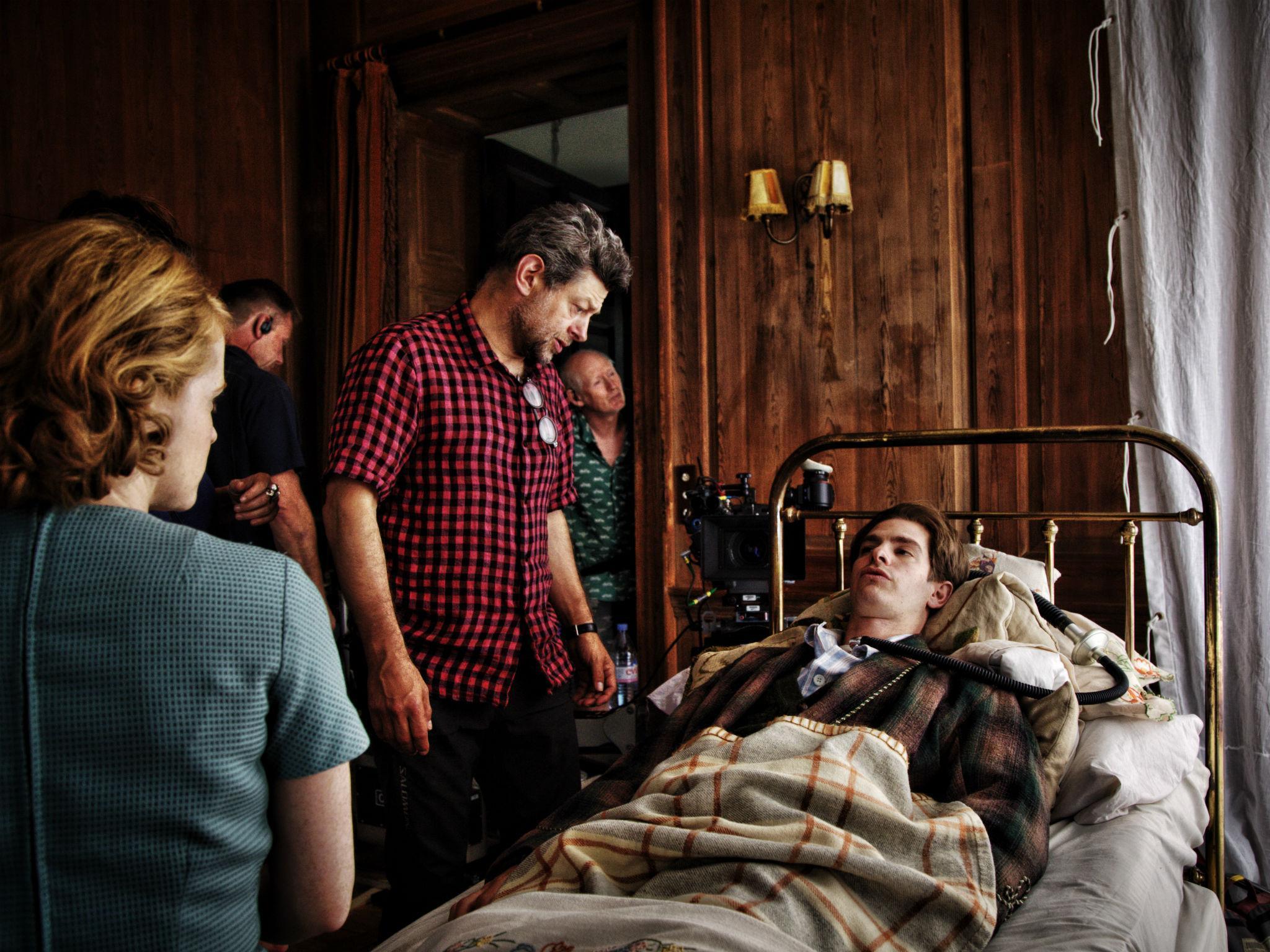 Andy Serkis (left) on the set of 'Breathe', about a man paralysed by polio (right, Andrew Garfield)