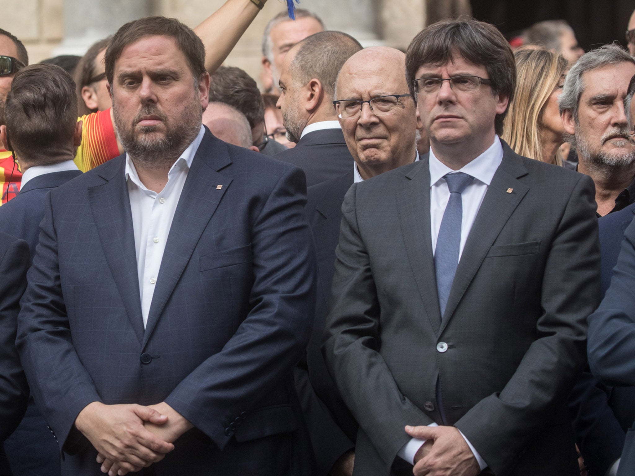 Catalan Vice-President Oriol Junqueras (right) standing with President Carles Puigdemont in Barcelona the day after the referendum