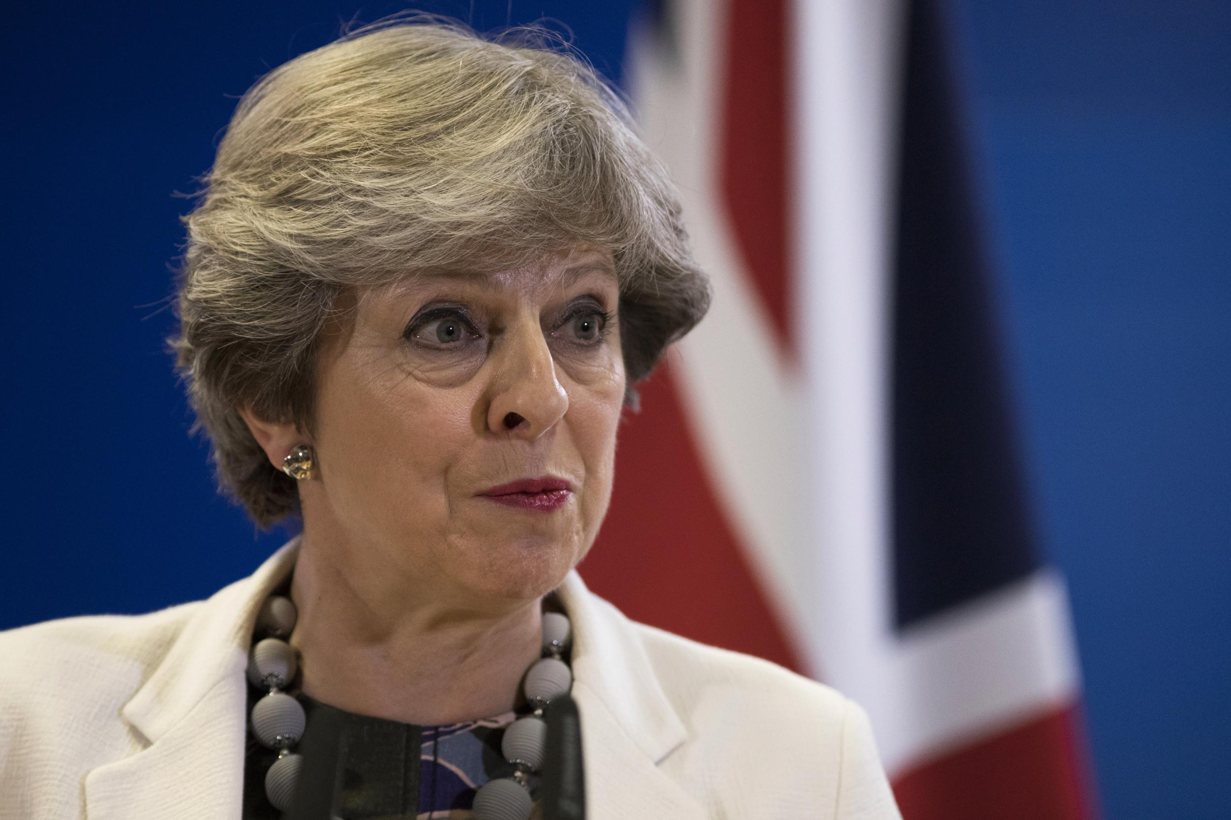 Theresa May holds a press conference at the Council of the European Union building on 20 October