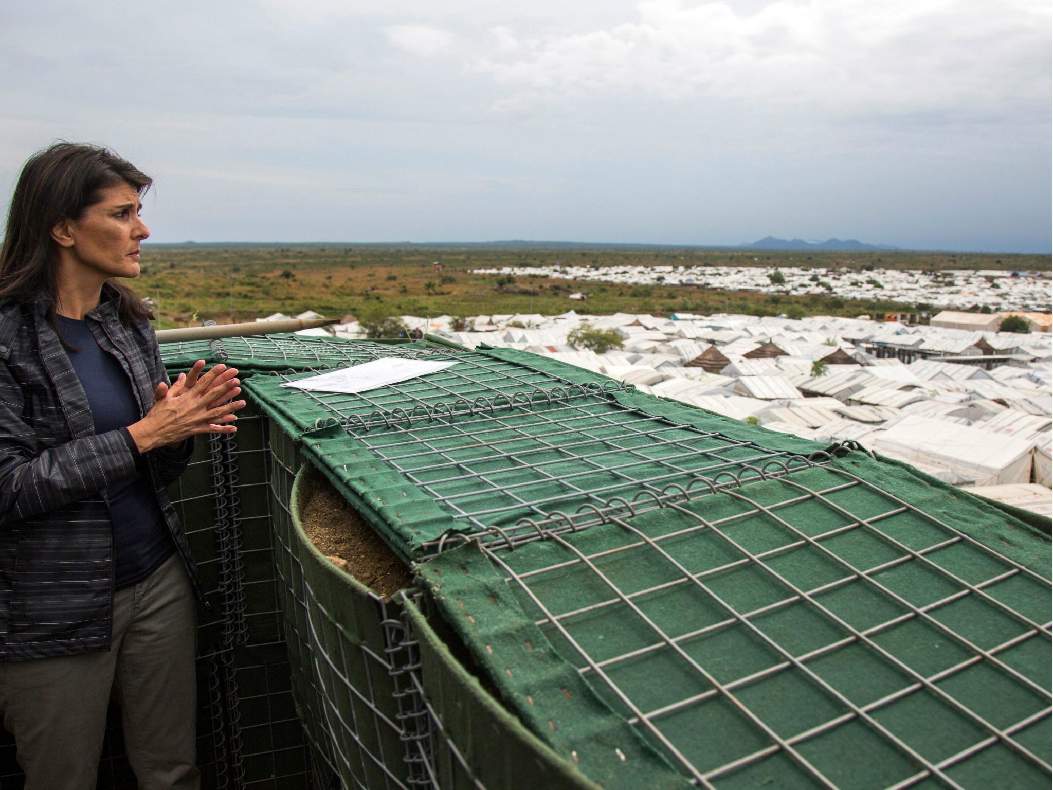 US Ambassador to the United Nations Nikki Haley looks from a UN watch tower at the UN Protection of Civilians (PoC) site in Juba, South Sudan, 25 October 2017.