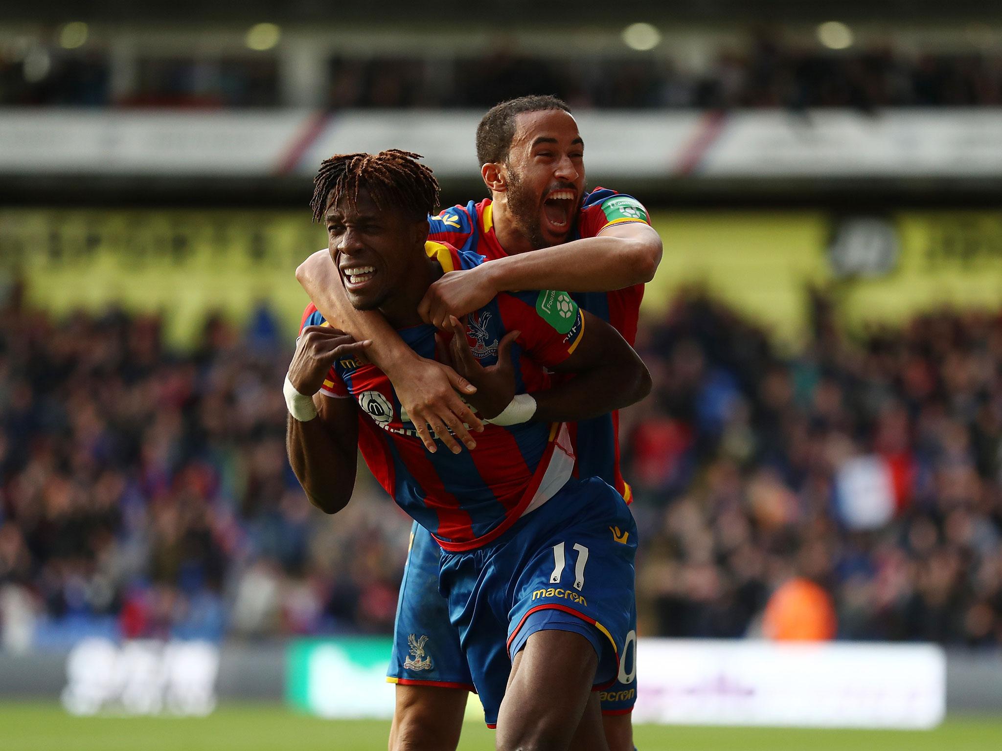 Wilfried Zaha celebrates his stoppage-time equaliser