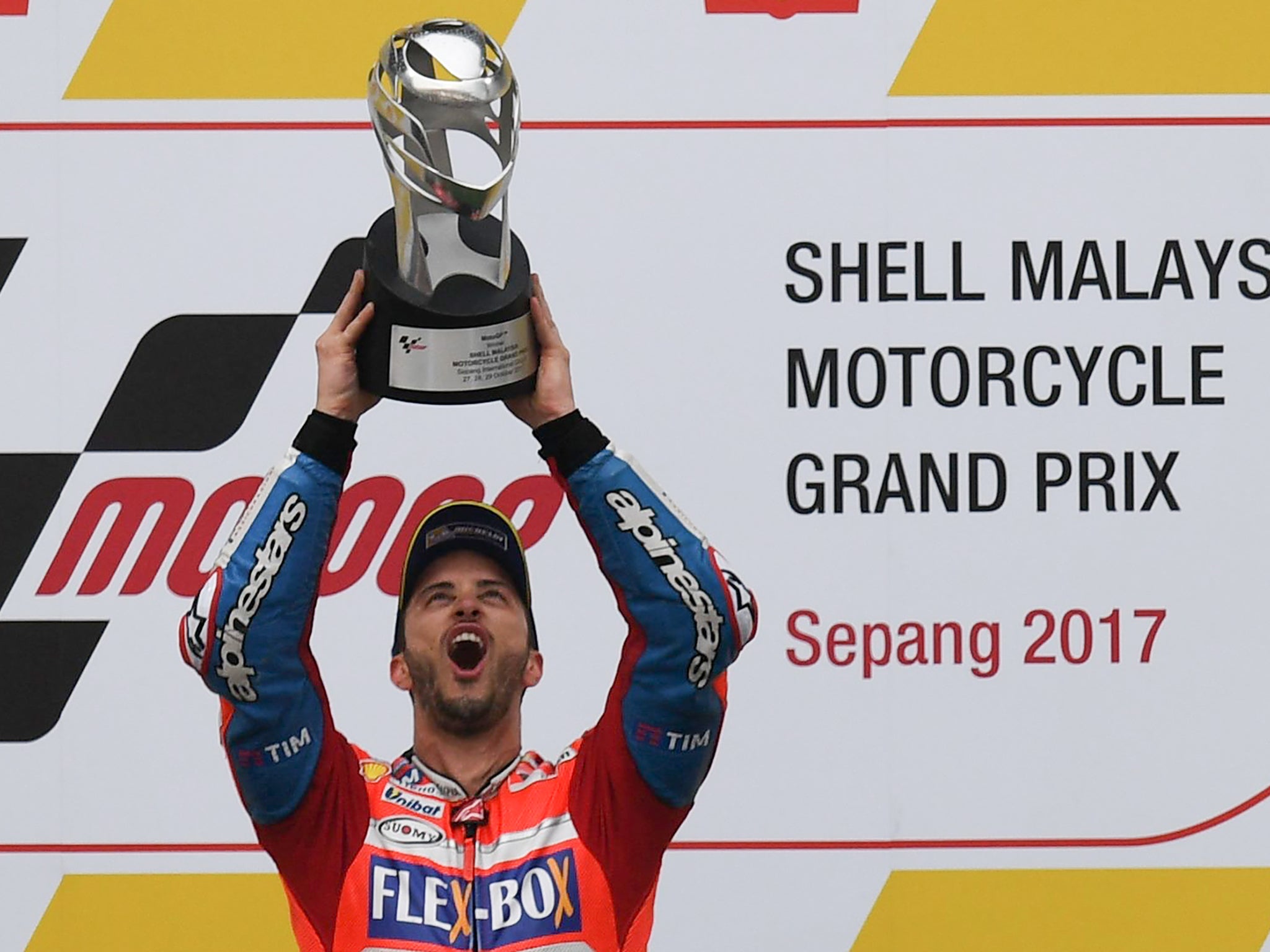 Andrea Dovizioso won the Malaysian Grand Prix to take the championship battle to Valencia