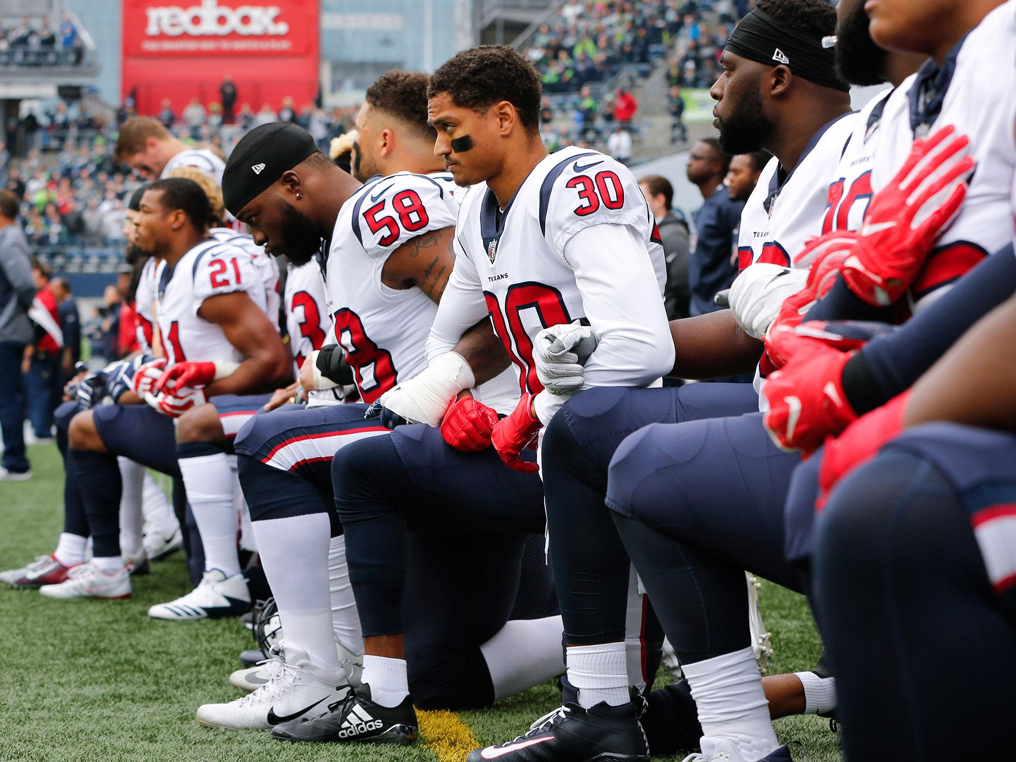 A number of Texans took a knee prior to the game