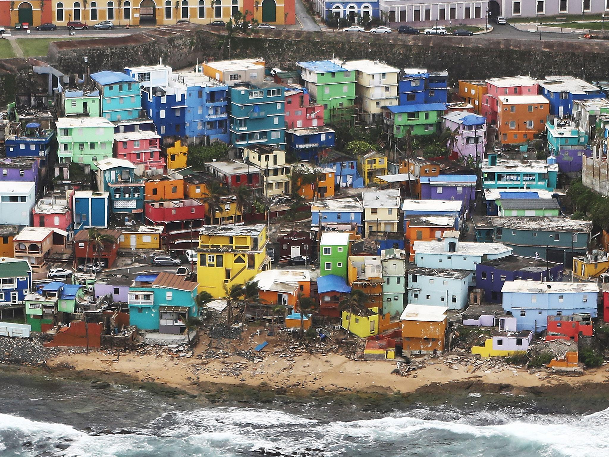 The damaged La Perla neighborhood viewed from the air during recovery efforts four weeks after Hurricane Maria struck Puerto Rico