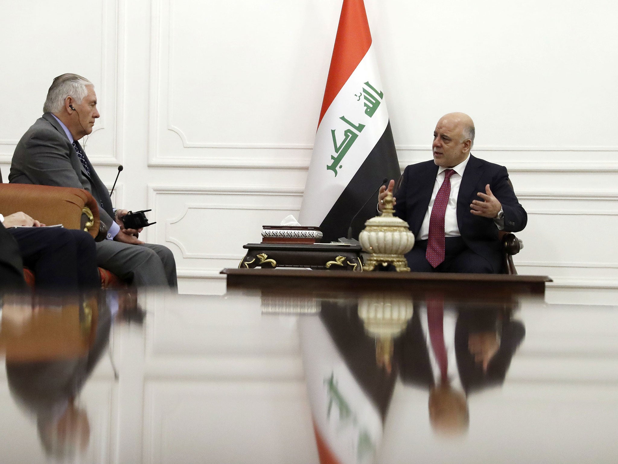 The Iraqi Prime Minister Haider al-Abadi (right), pictured here during a meeting with US Secretary of State Rex Tillerson, has emerged with his reputation buoyed after successes over Isis and the Kurds