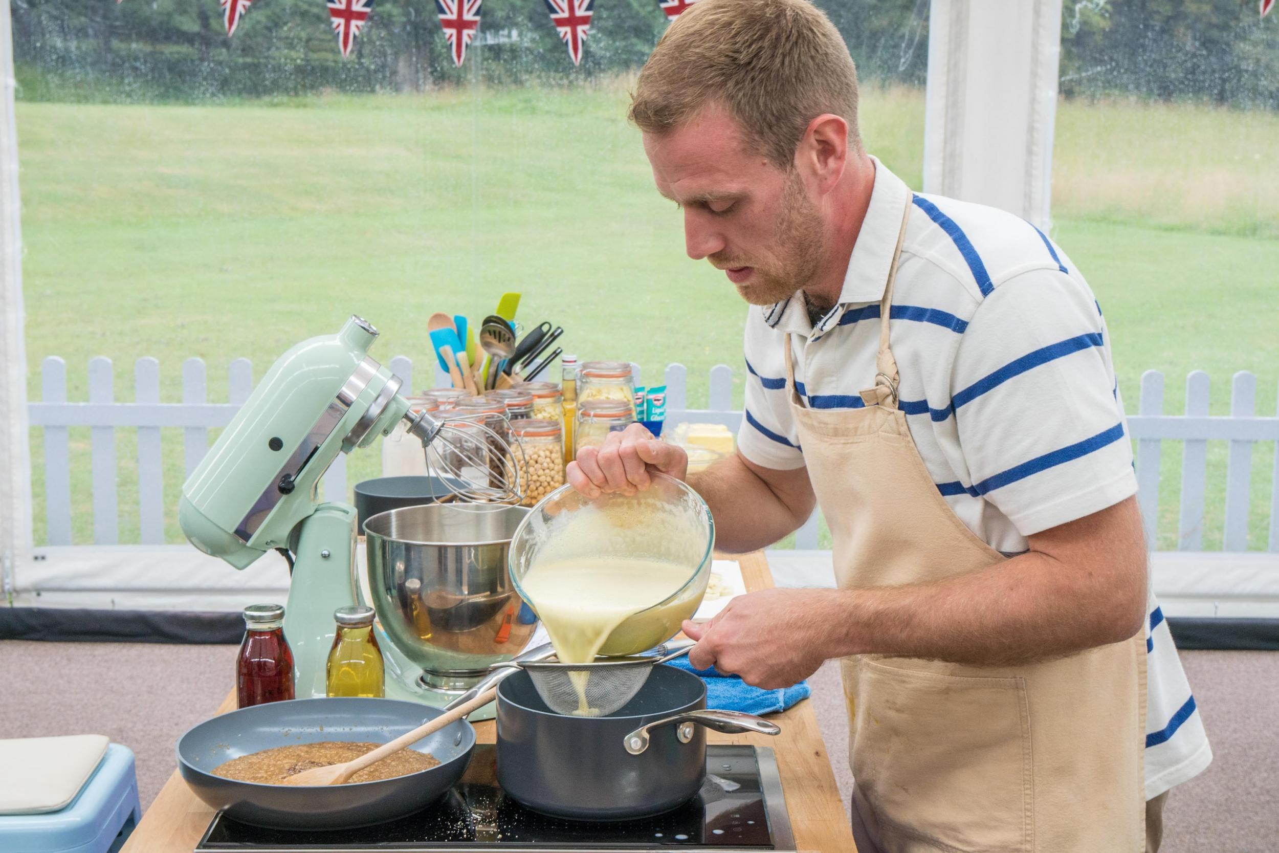 Steven, who was crowed star baker three times, at his work station