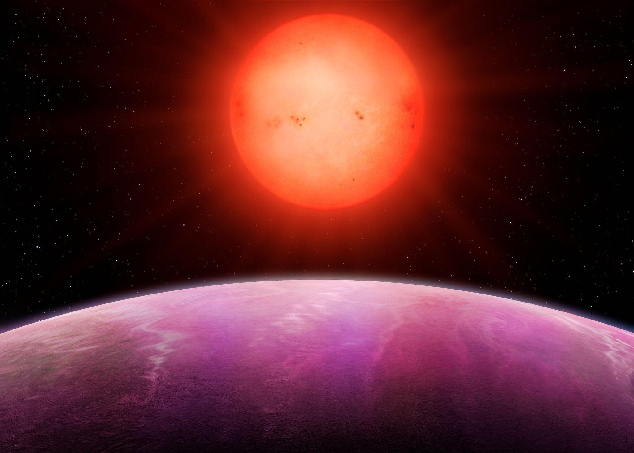 An artist's impression of a planet orbiting a red dwarf star