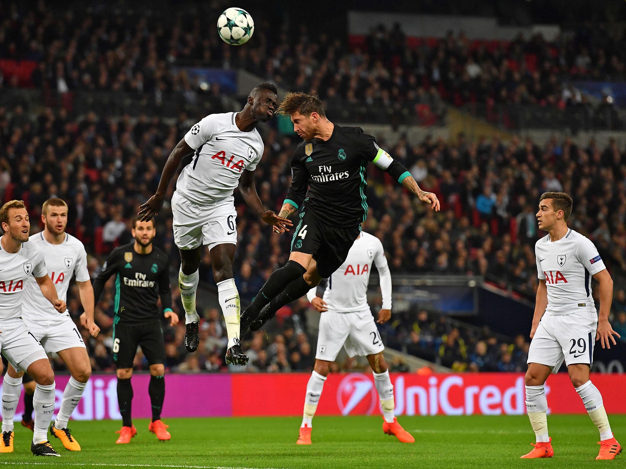 Ramos gets a header off under pressure from Sanchez (Getty)