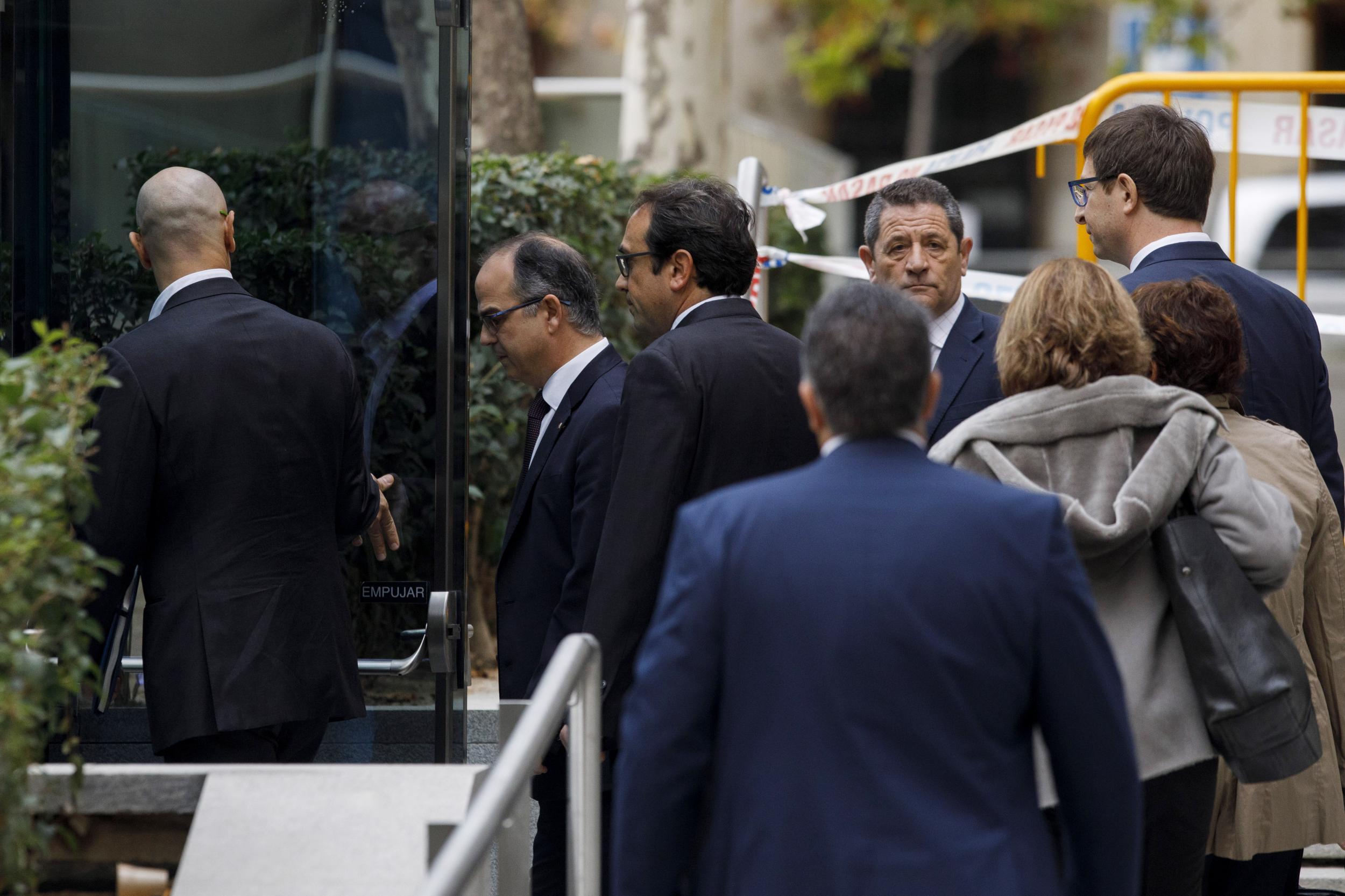 Former members of the Catalan government arrive at Spain's National High Court on Thursday