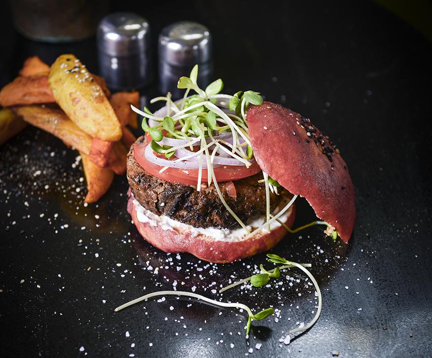 The vegan food – like this burger at Meshek Barzilay – is the way to get close to the land in Tel Aviv