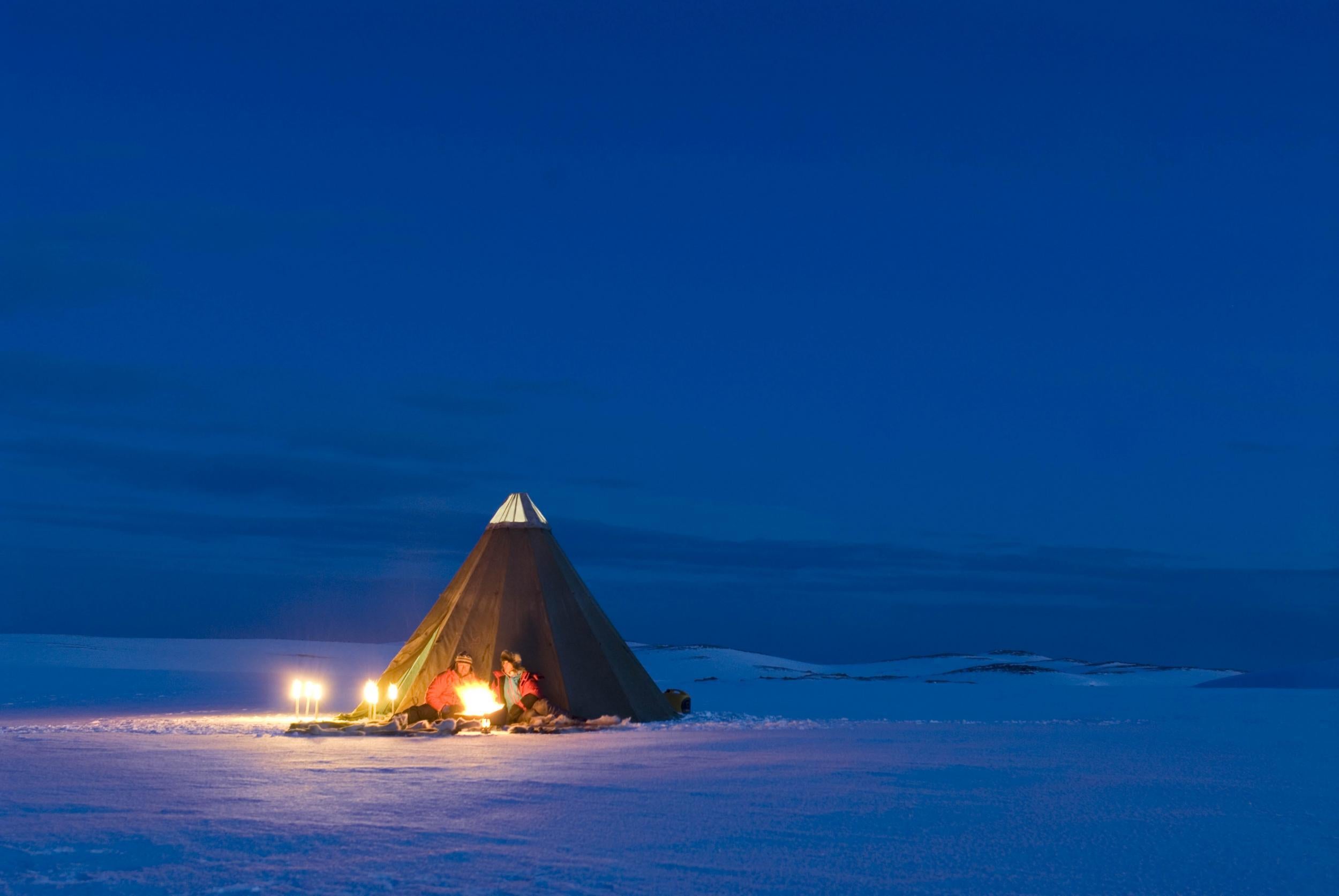 Stay overnight in a Sami Lavvo (visitnorway.com)