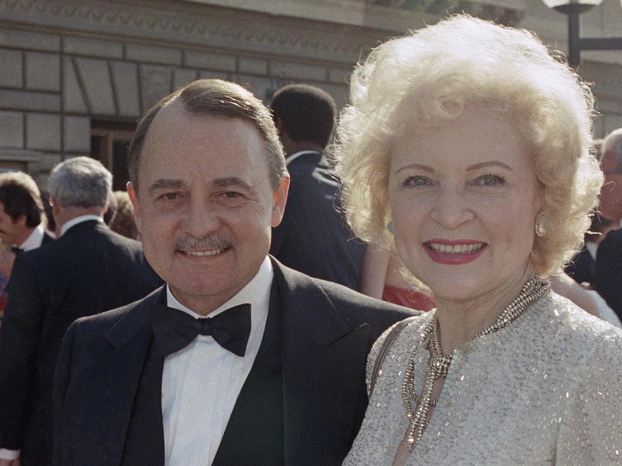 John Hillerman pictured with Betty White the 1985 Emmy Awards in Pasadena, California