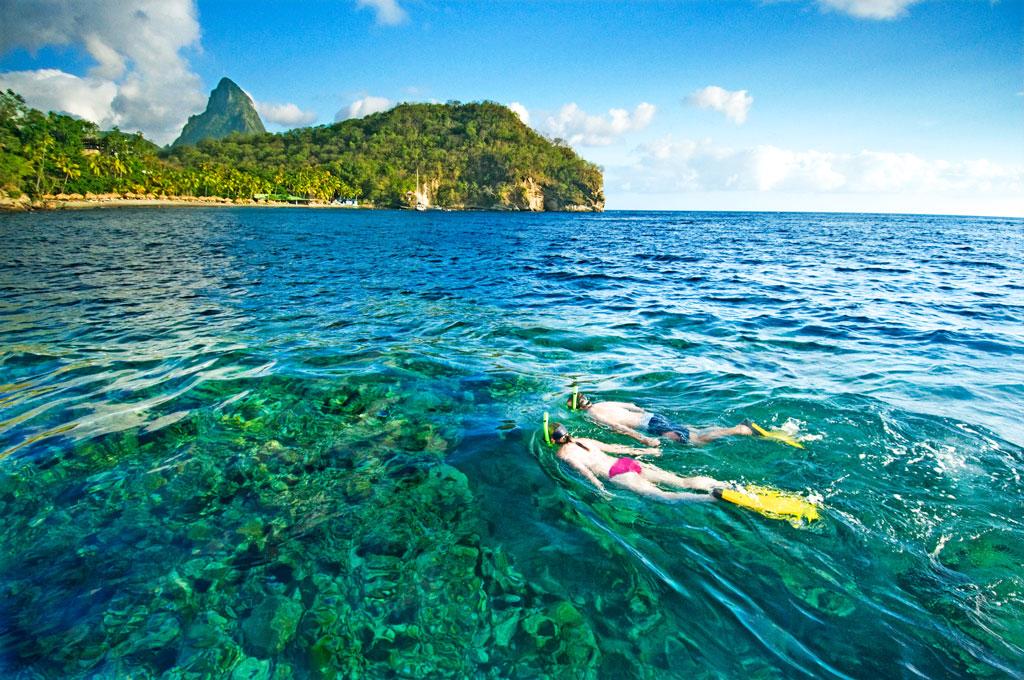 Snorkel in the island’s tranquil, turquoise blue seas