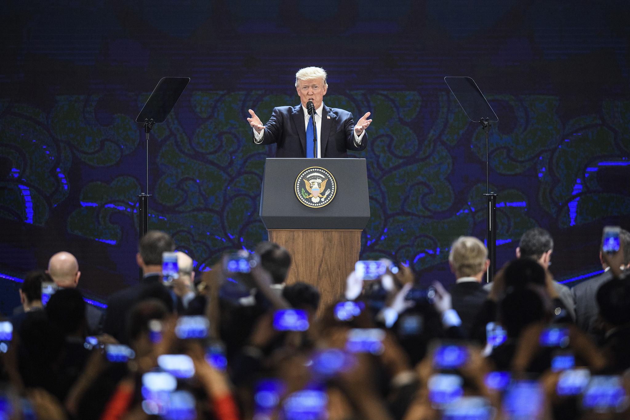 The US President speaks on the final day of the Apec summit in Da Nang, Vietnam