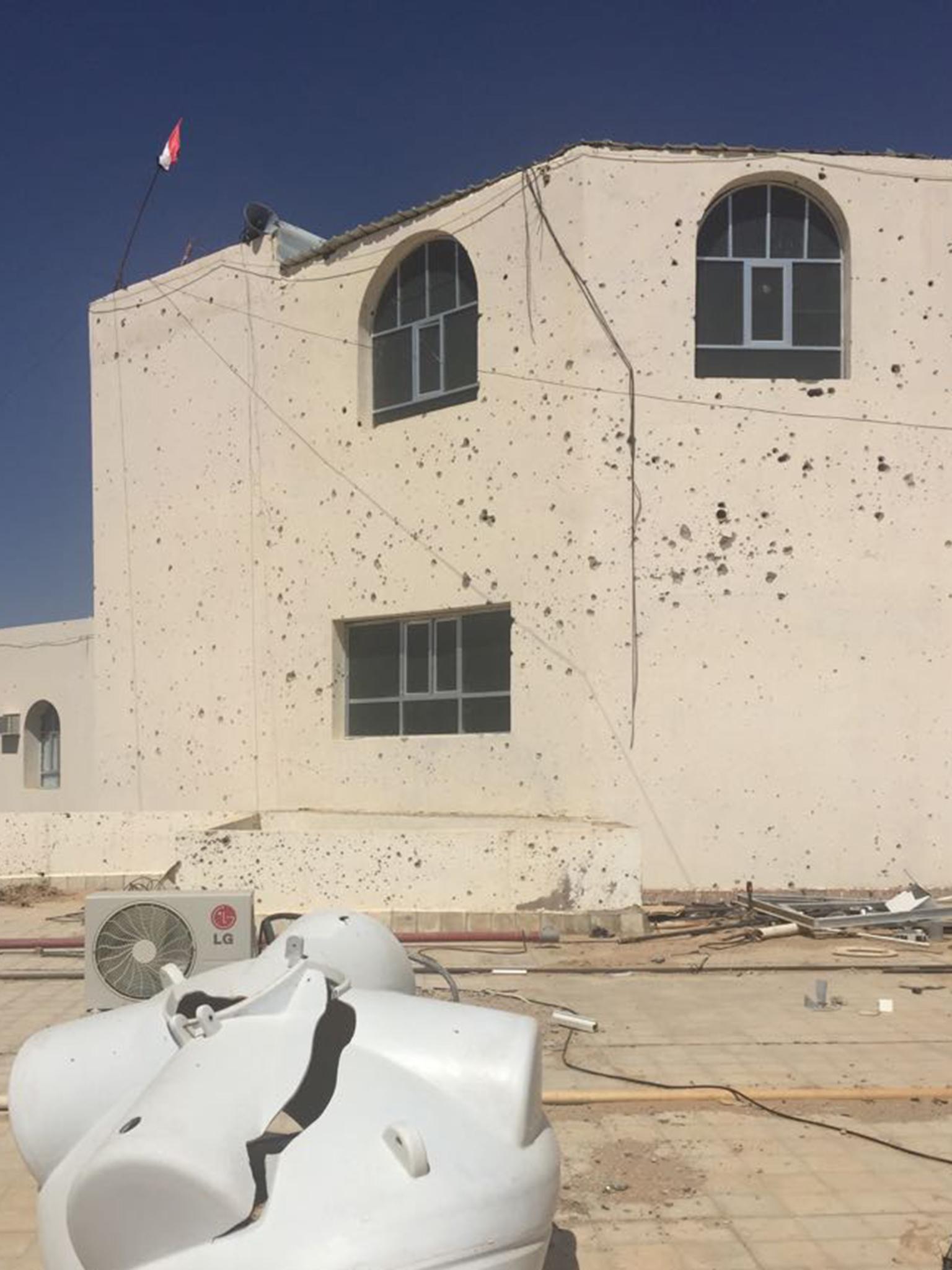 Bullet holes pockmark Marib General Hospital’s walls and roof