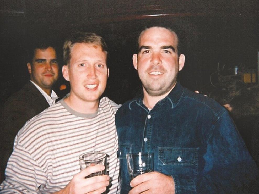 O'Neil McGean, right, and former partner Brian Betts, a popular DC principal who was killed in 2010, in the mid-1990s. Both were later murdered in two separate crimes, years apart