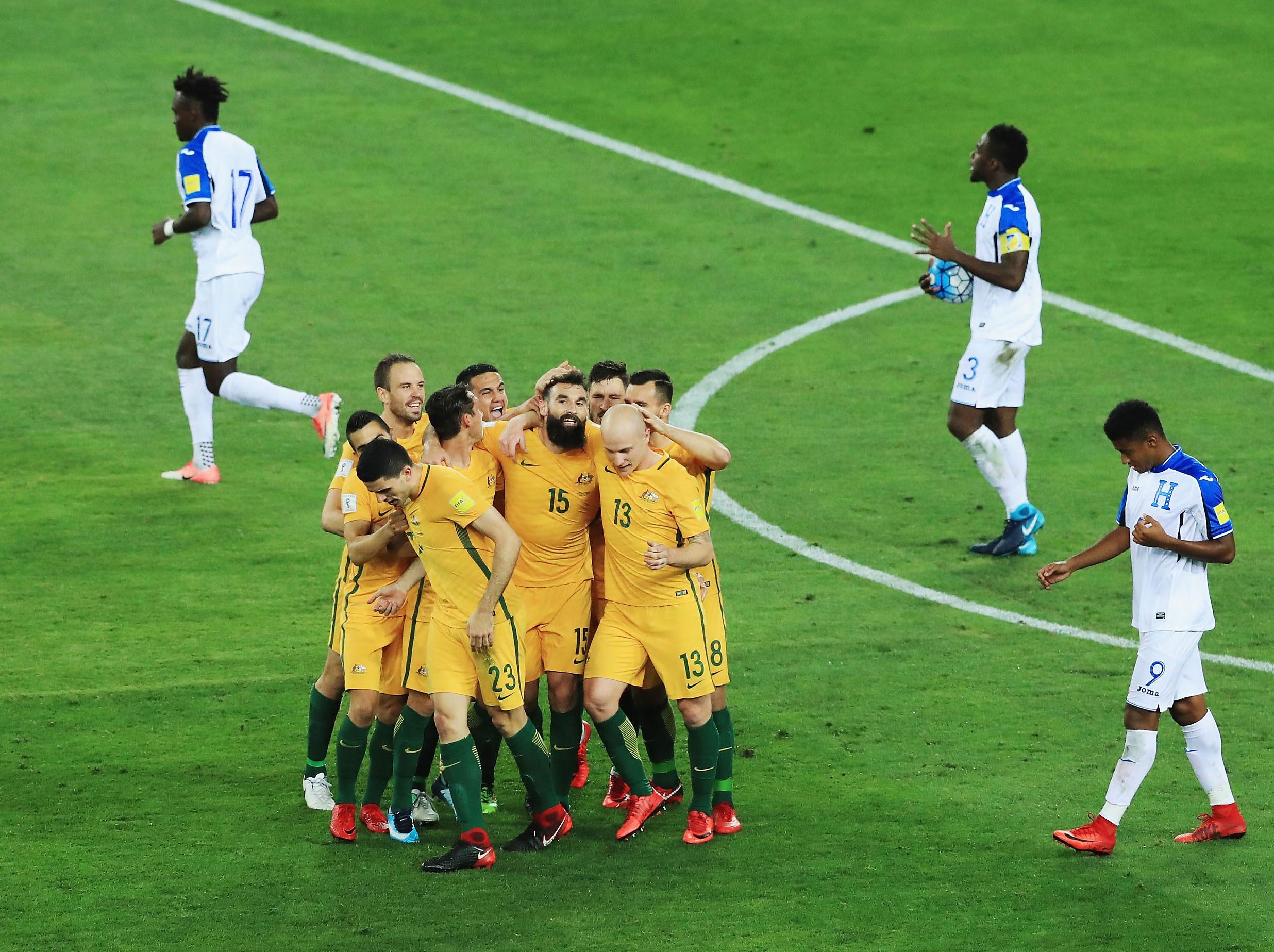 Aston Villa's Mile Jedinak scored a hat-trick to secure victory for Australia