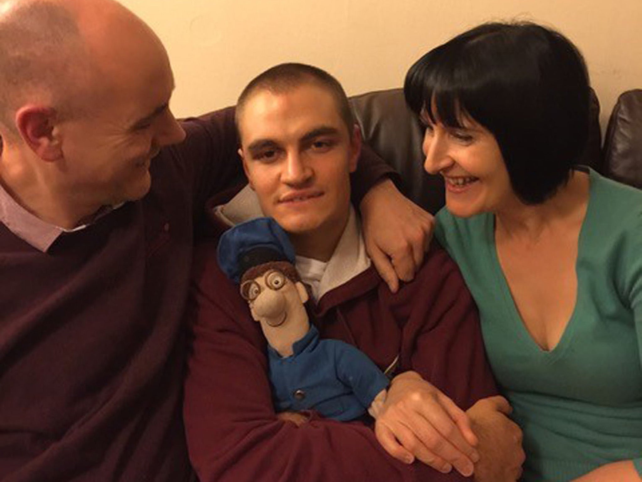 James and Cindy Dutton with their 19-year-old son Thomas, who is severely autistic