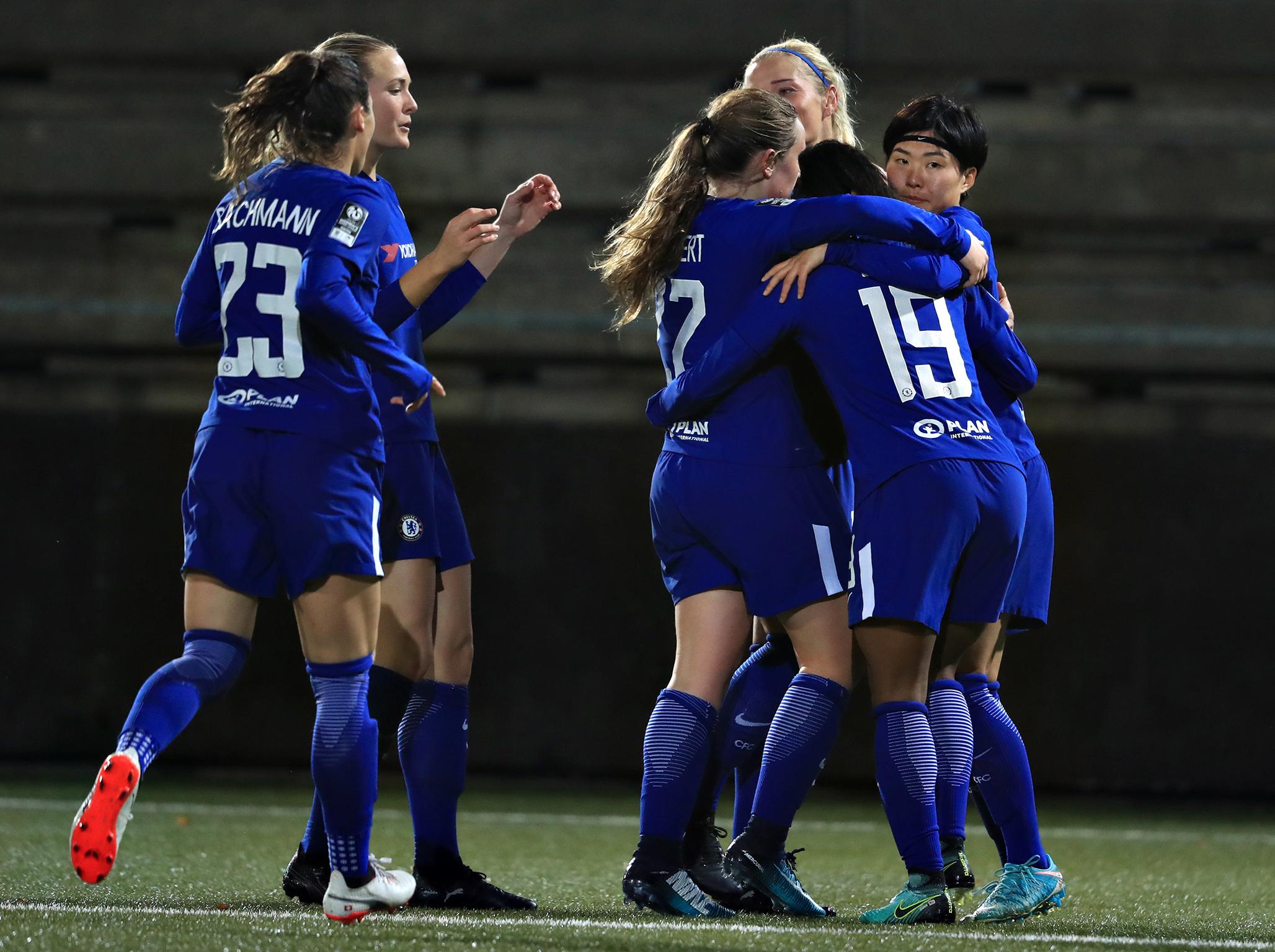 Ji So-Yun, right, celebrates with her Chelsea team-mates