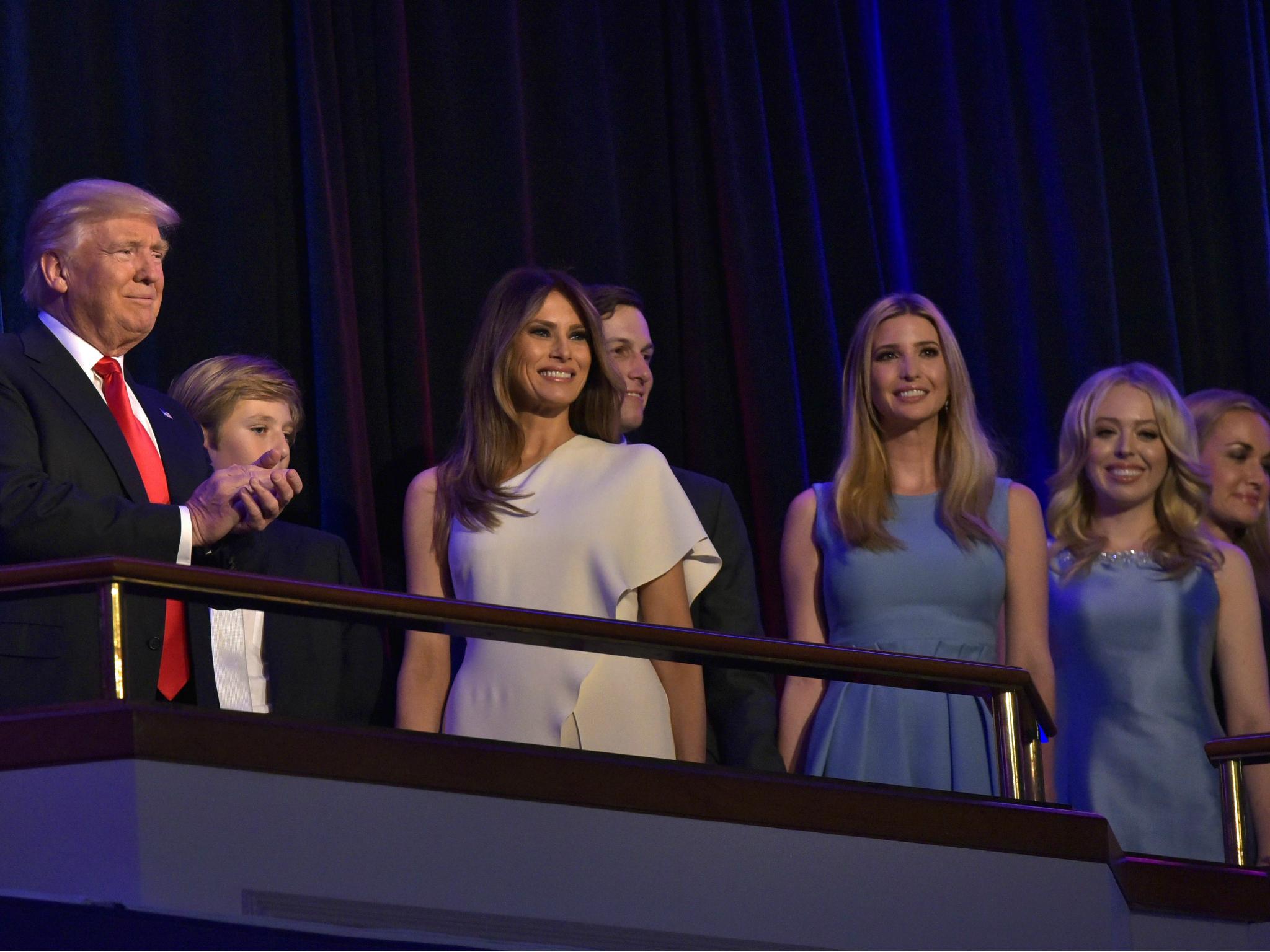 President Donald Trump applauds next to his soon Barron, his wife Melania, son-in-law Jared Kushner, and daughters Ivanka and Tiffany during election night on 9 November 2016.