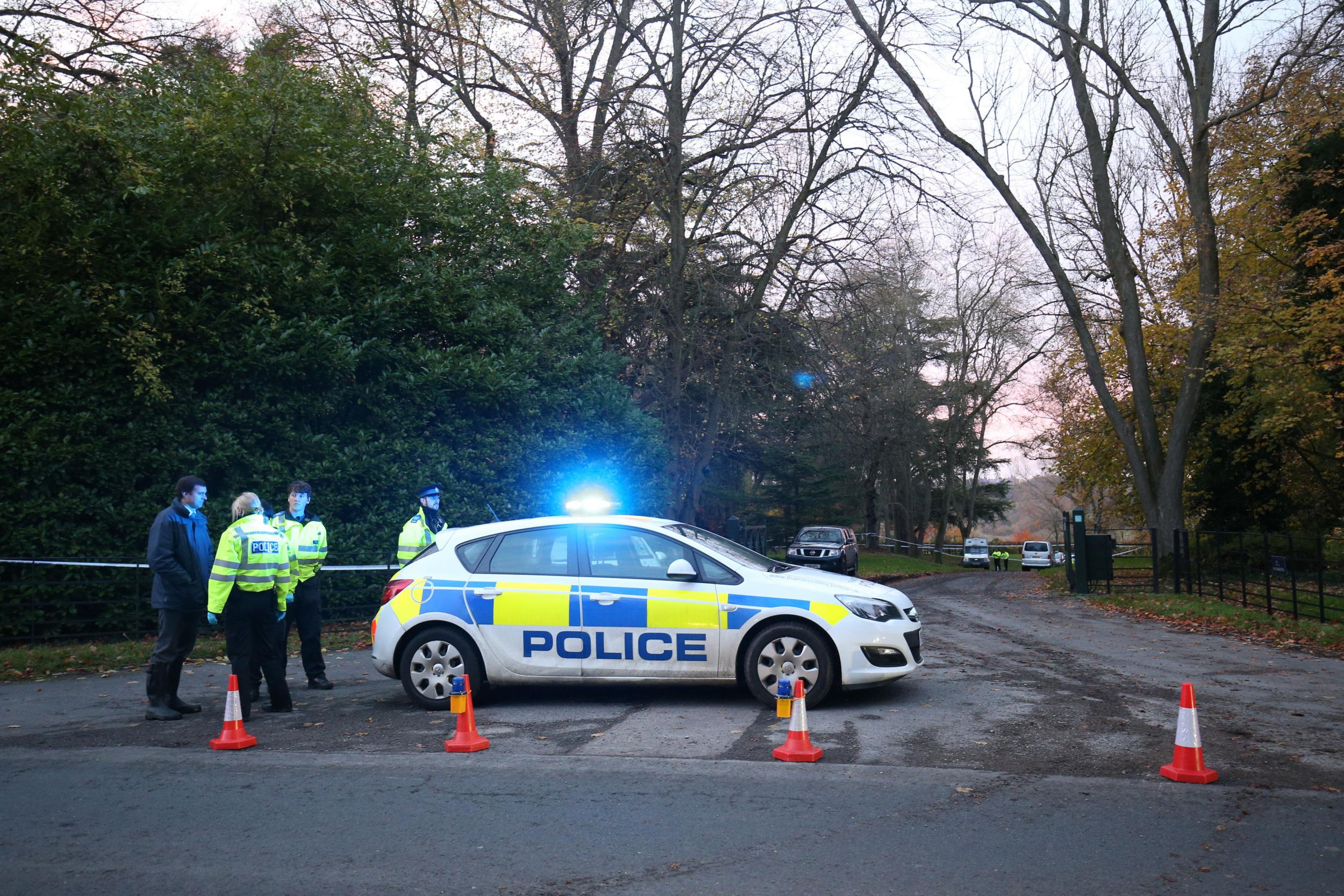 Police at the scene of the crash near Waddesdon, Buckinghamshire